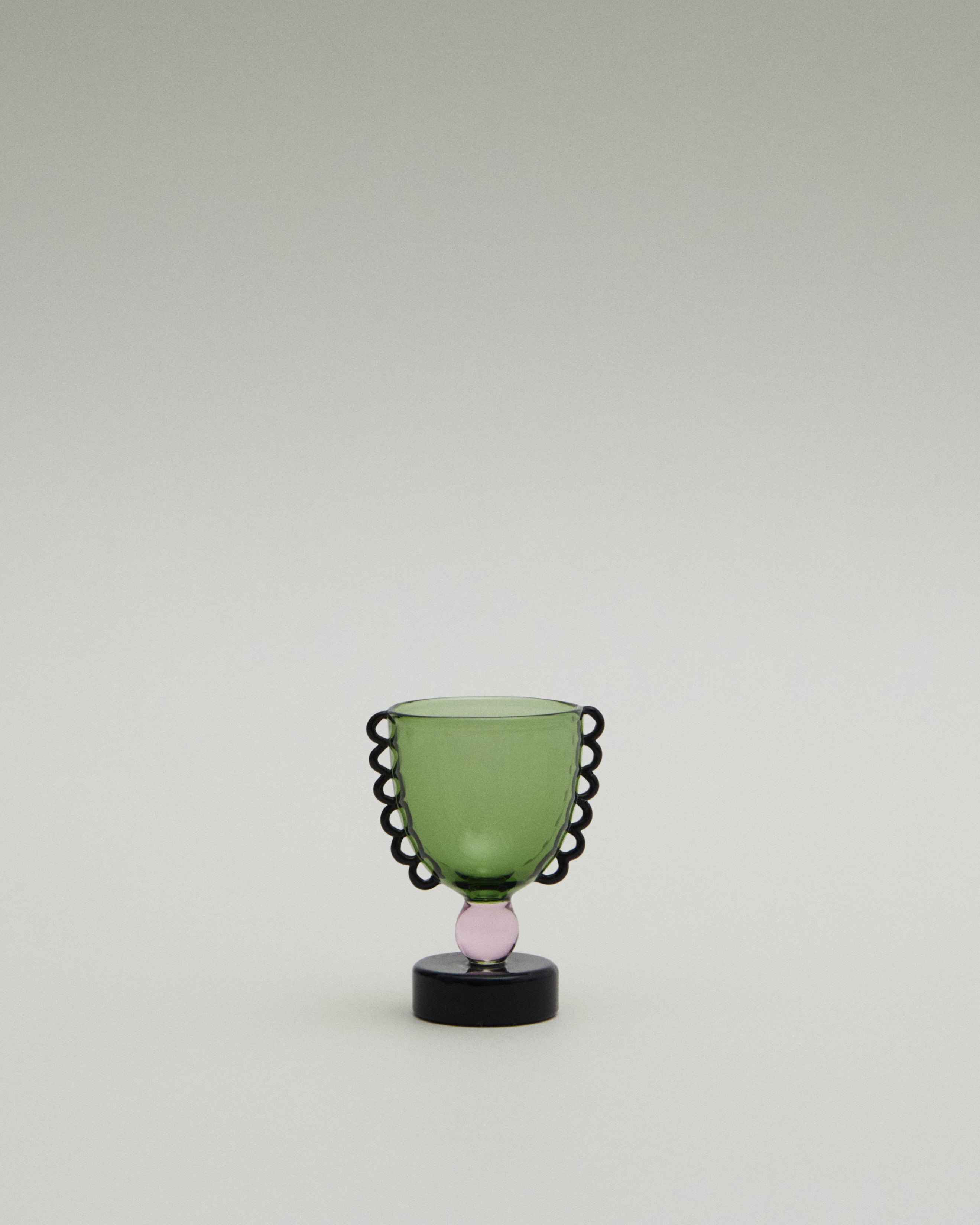 Coco Egg Cup Set — back view showing green glass and black base