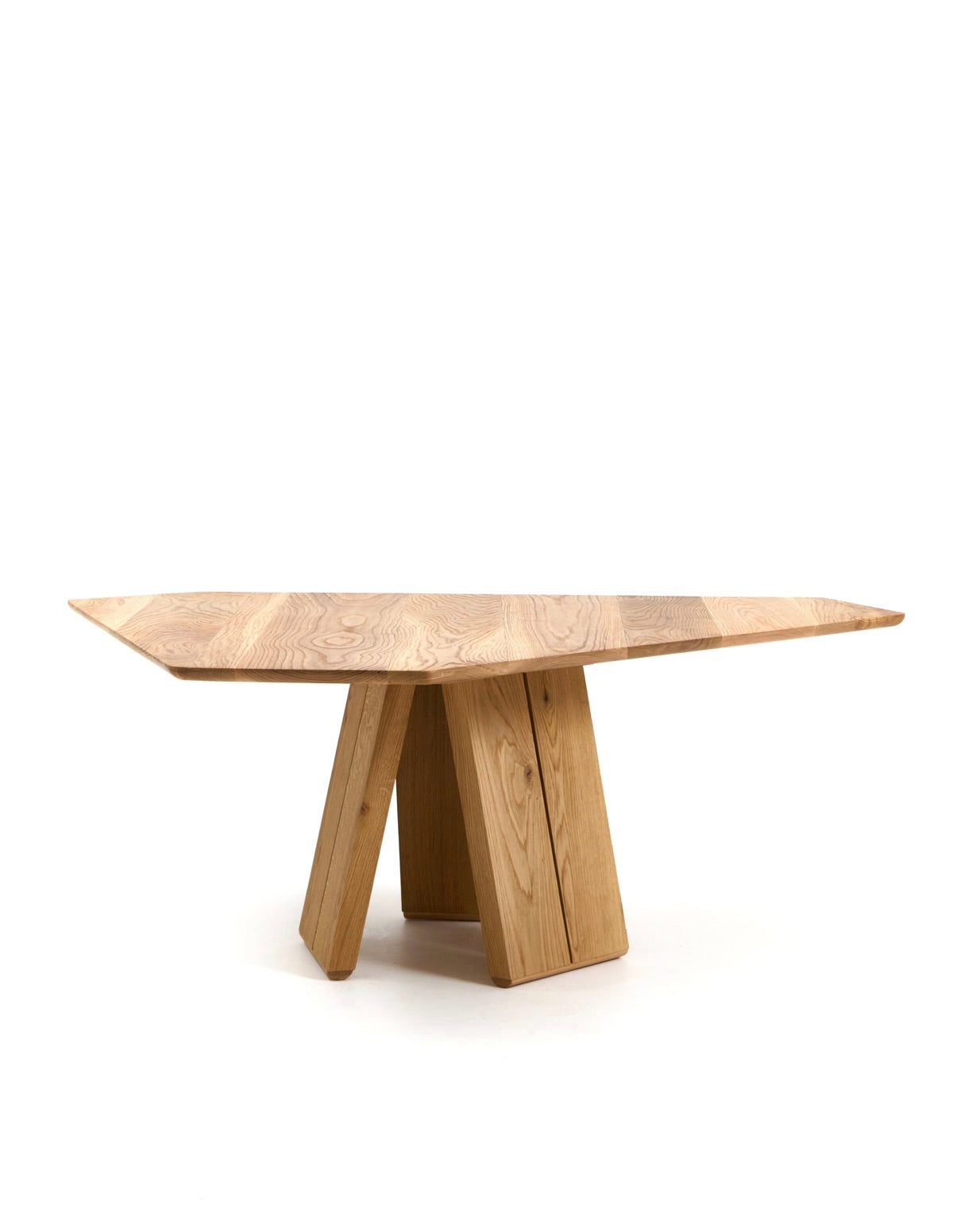 Modern oak dining table with geometric angular pedestal base