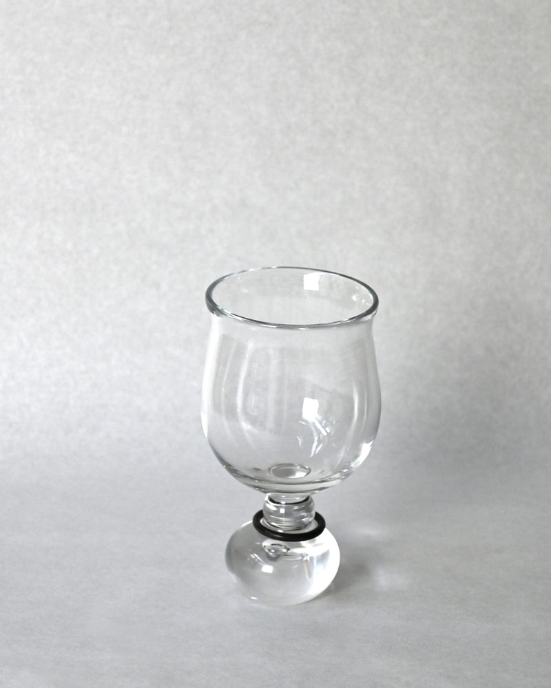 Clear glass goblet with rounded bowl and ball stem from EDEN drinkware set