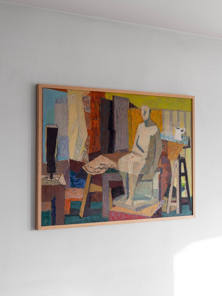 A Large Vintage Modernist Oil Painting from the 1940s by Spigel adorns a light-colored wall, showcasing a seated figure amid geometric shapes and bold hues of yellow, orange, and blue. Natural light gracefully casts a shadow on the wall.
