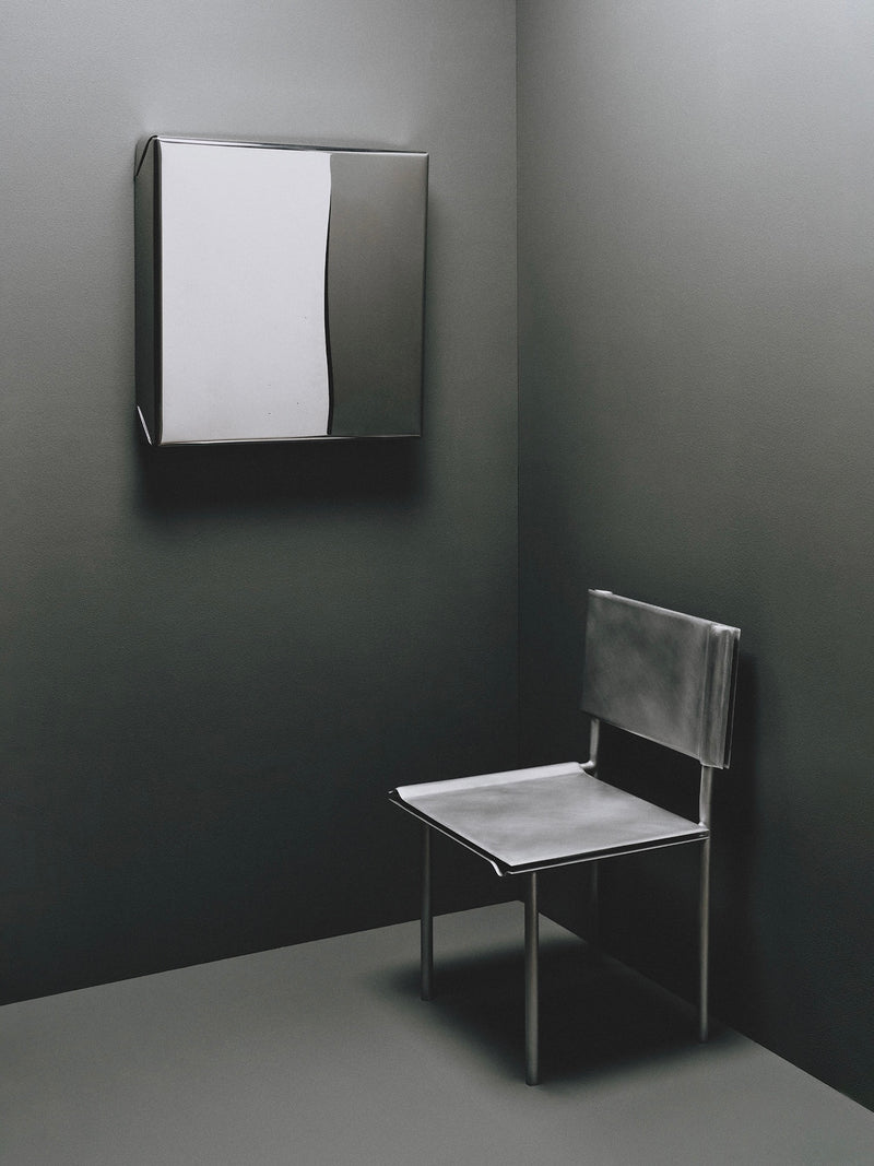 Contemporary fold mirror with geometric design by Estudio Persona