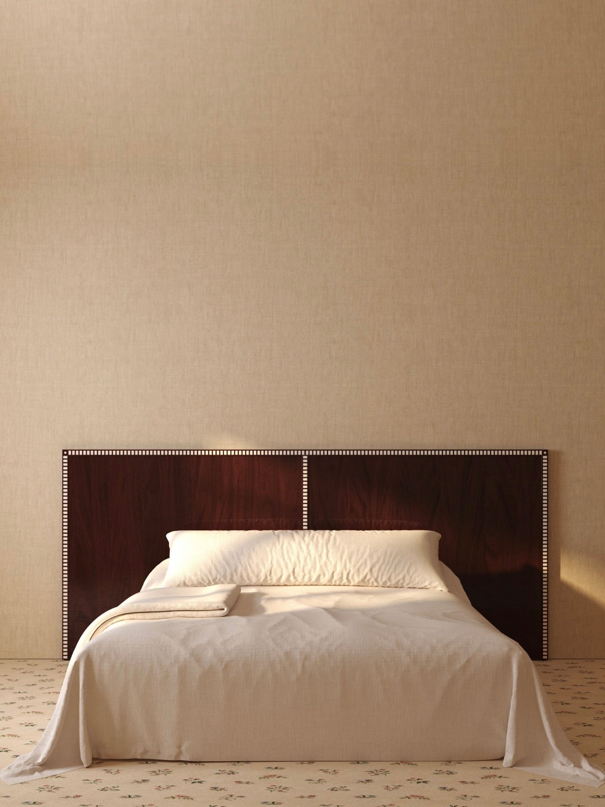 A minimalist bedroom features a large bed with white linens centered against a light beige wall. The bed is adorned with two pillows and boasts an elegant Lemon "Aquarama" Headboard in African Mahogany. The wall behind the bed is plain, and a patterned carpet covers the floor.