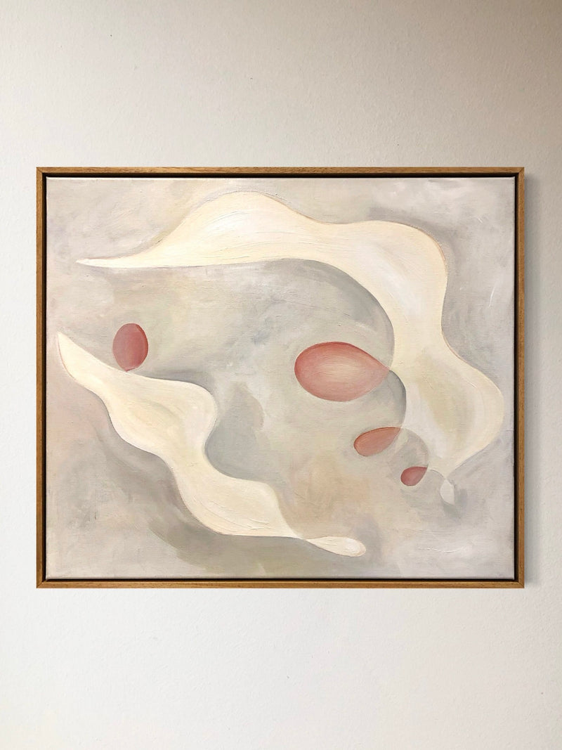The "Tracing Light, 2024" painting by Cate Adriana features flowing cream-colored shapes and reddish ovals set against a soft gray background. Framed with a thin wooden border, this acrylic artwork beautifully conveys a sense of movement and calmness, akin to tracing light through serene pastels.