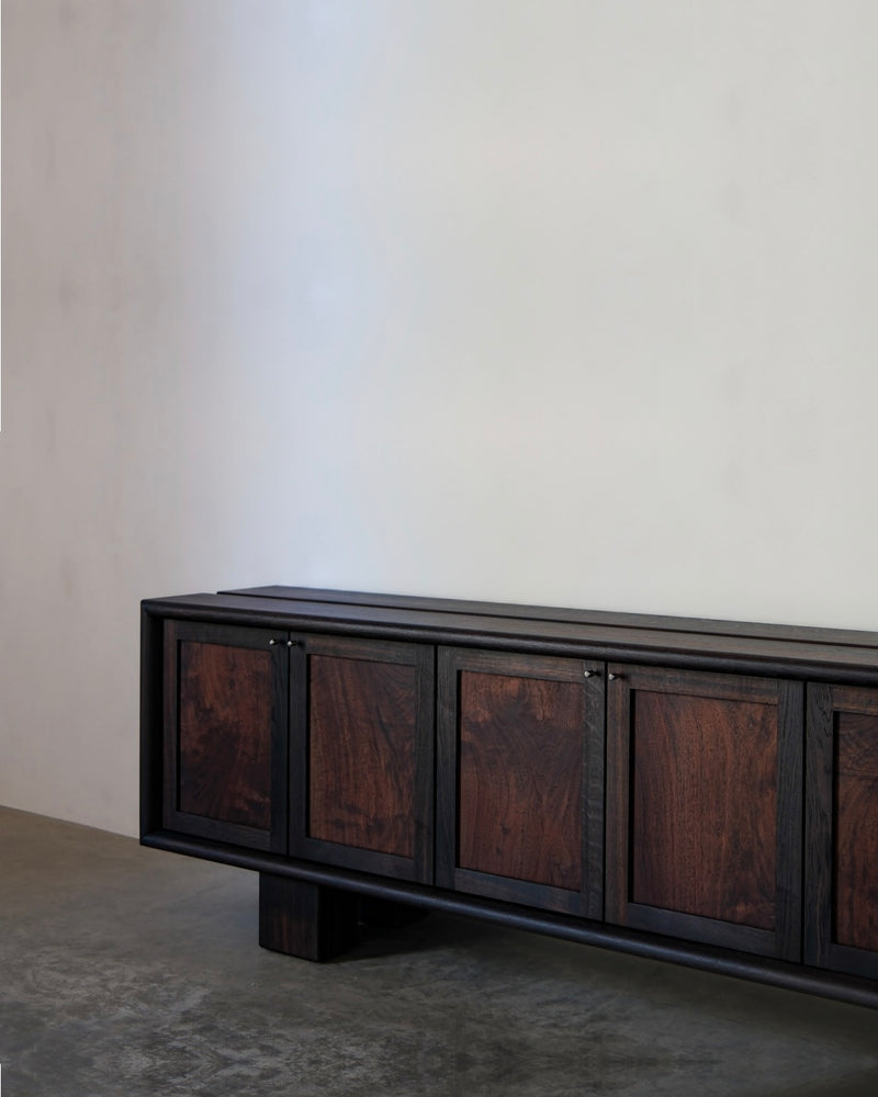 Elwha Cabinet — side view showing dark wood finish and cabinet doors