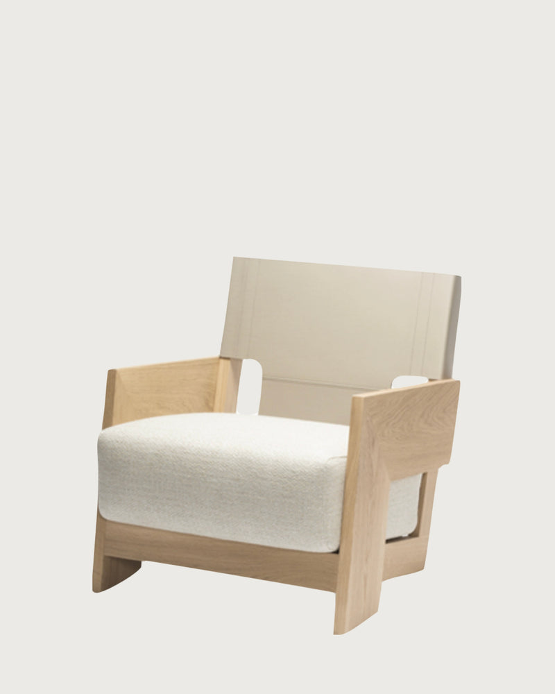 Walden armchair in natural oak with cream upholstery, profile view