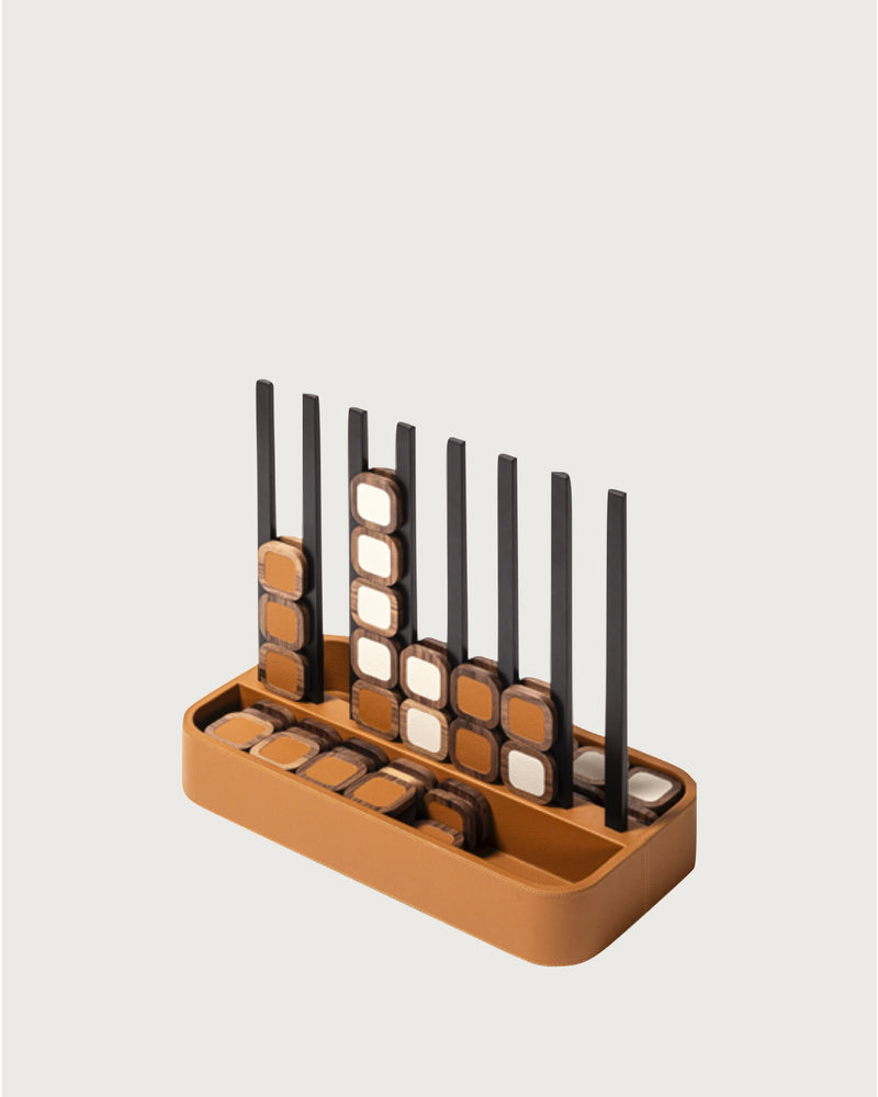 Luxury leather Connect 4 game with wooden sticks detail view