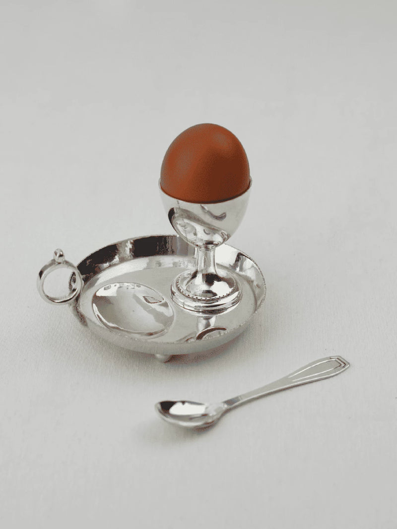 Silver egg cup with matching tray and spoon serveware set
