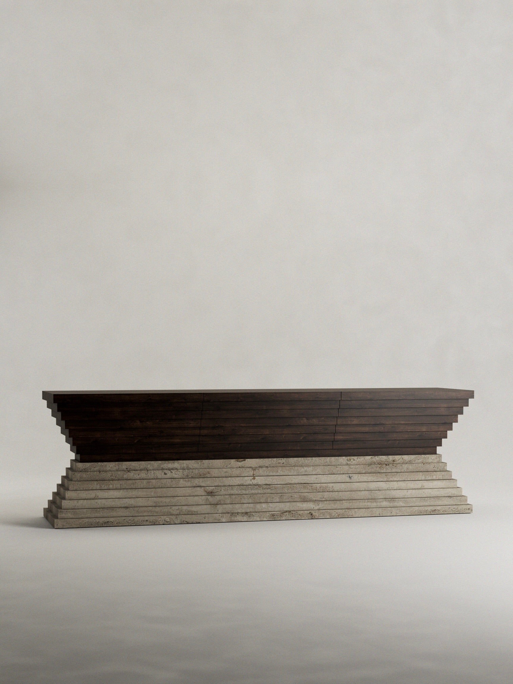 The "Calakmul" Sideboard by Siete Studio is a long, dark wooden console table with a solid walnut top and stepped design, featuring tiered geometric shapes atop a textured travertine base against a plain, light background.