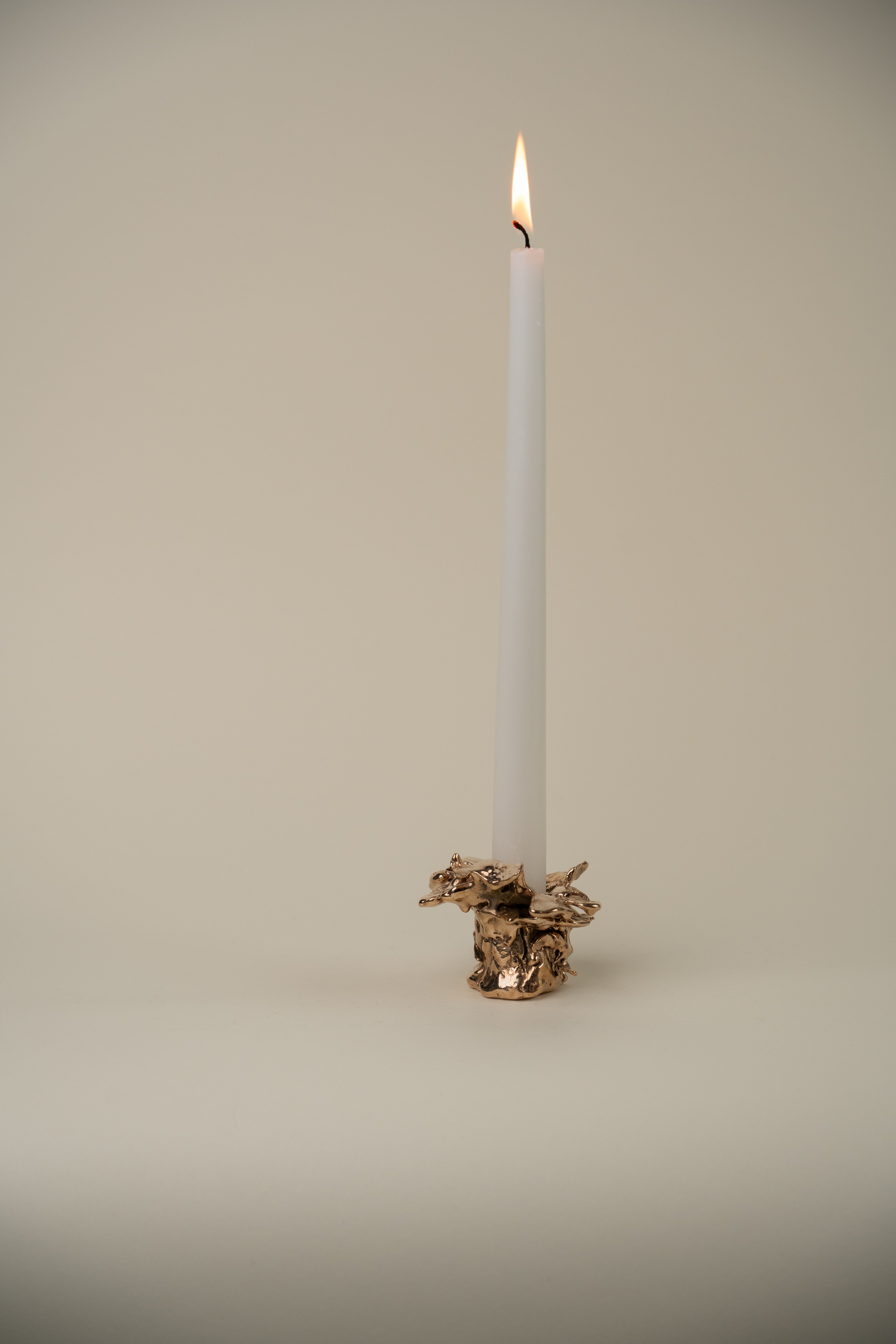 Handcrafted wooden candle holder in the shape of a chanterelle mushroom