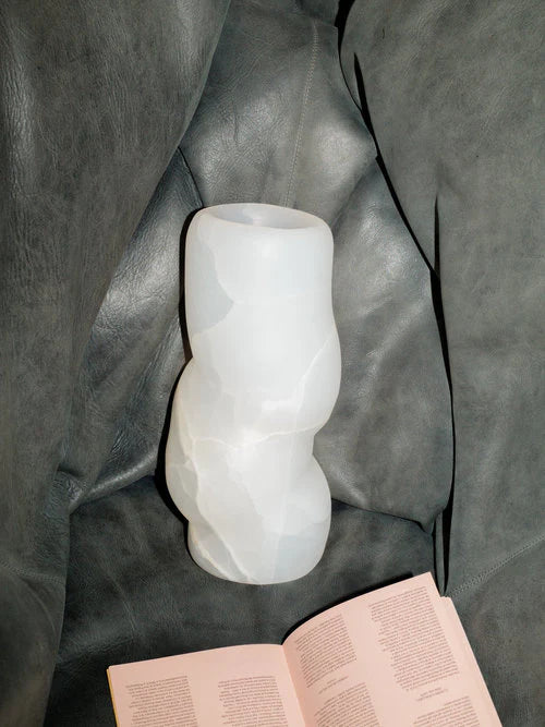 FATROLL White Onyx Vase in Marble — positioned on gray leather chair