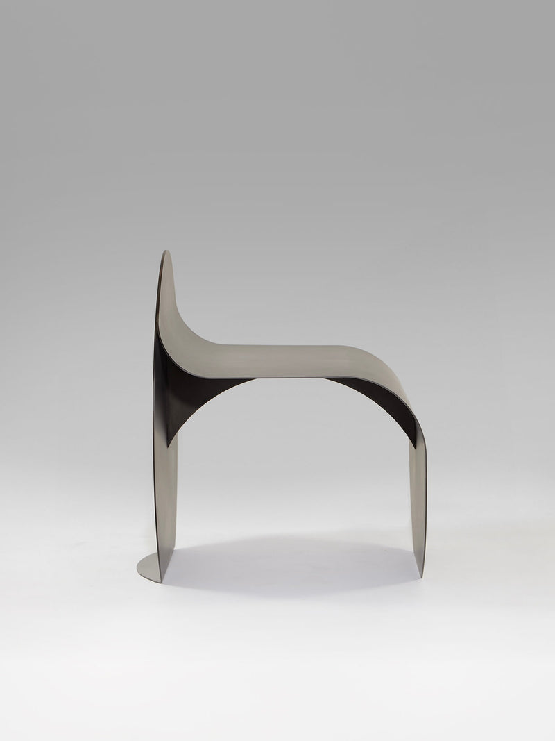 O Stool curved metal chair profile view by Estudio Persona