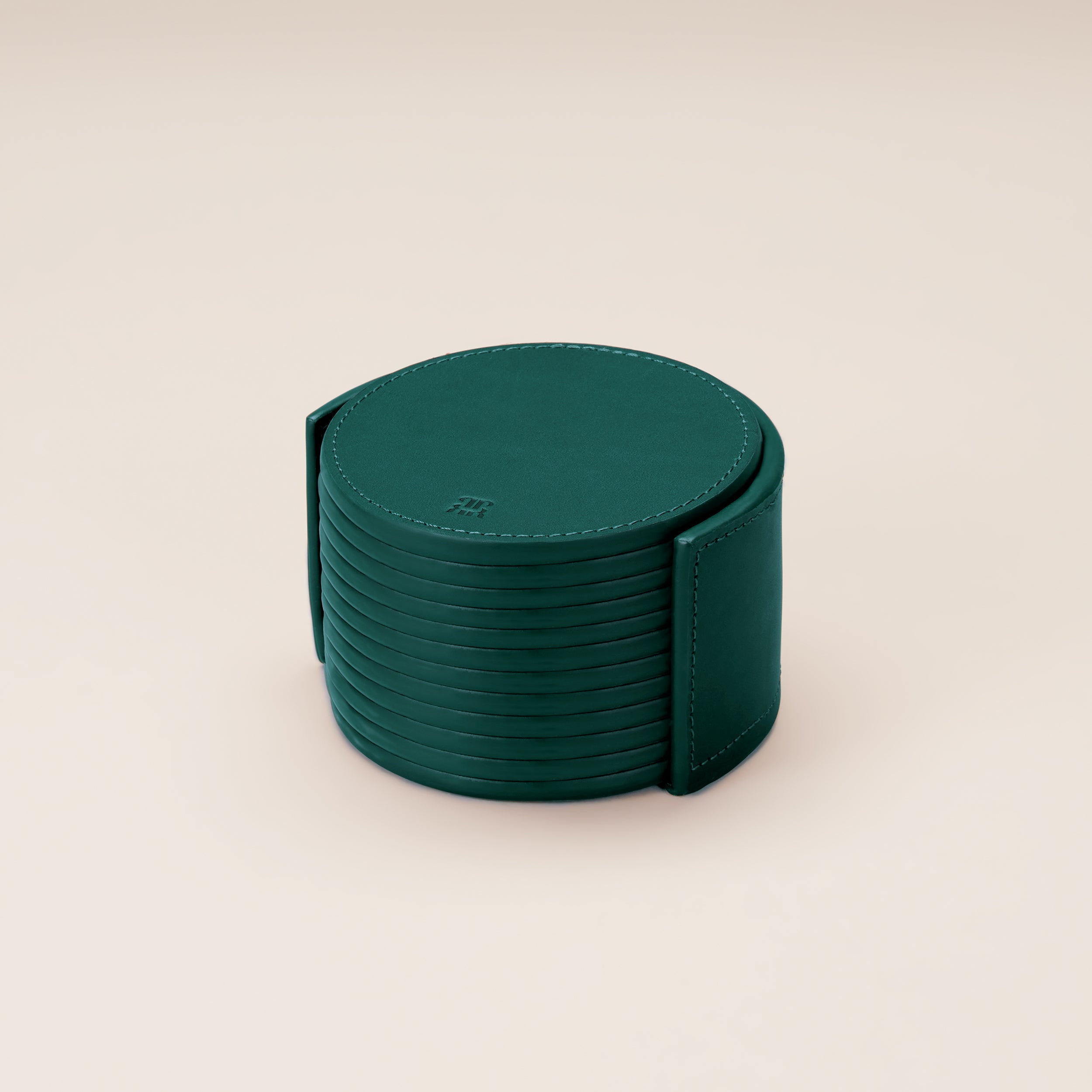Leather Coasters in Holder (set of 12) — top view of green leather coasters