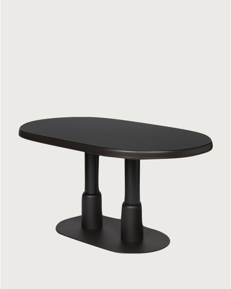 Black oval dining table with dual cylindrical pedestal base by Giobagnara