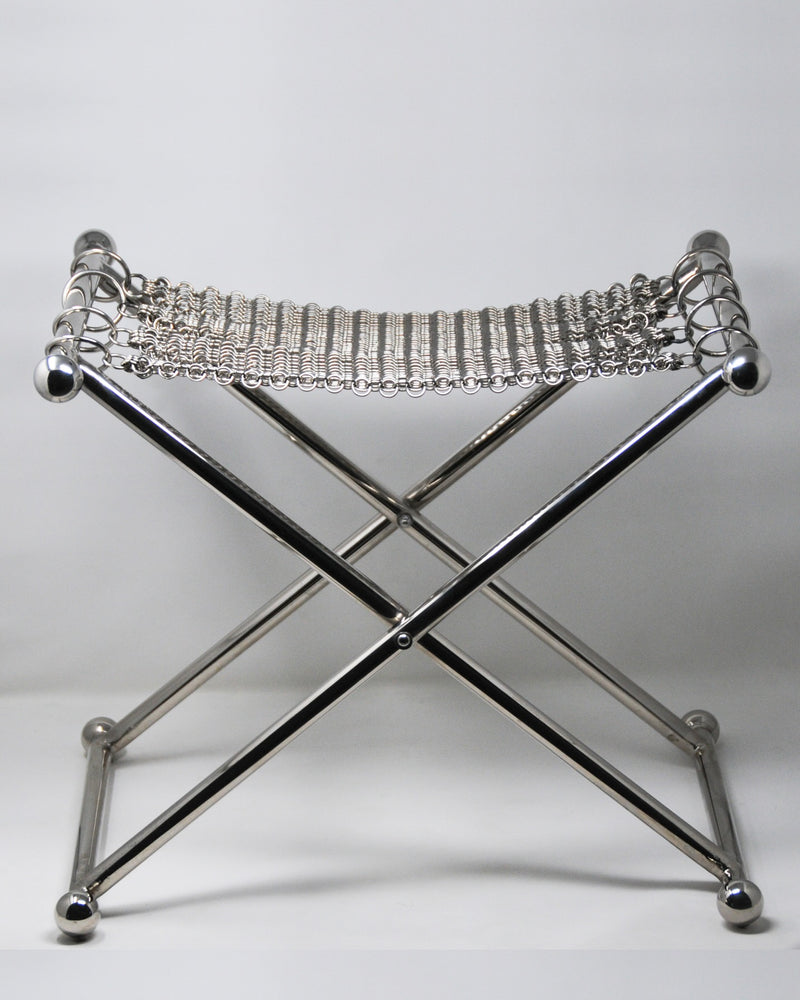 Chrome chainmail camping stool with X-frame folding base by Panorammma