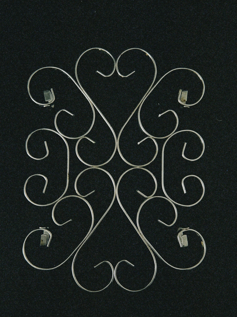 Large silver swirl plate coaster with elegant spiral design