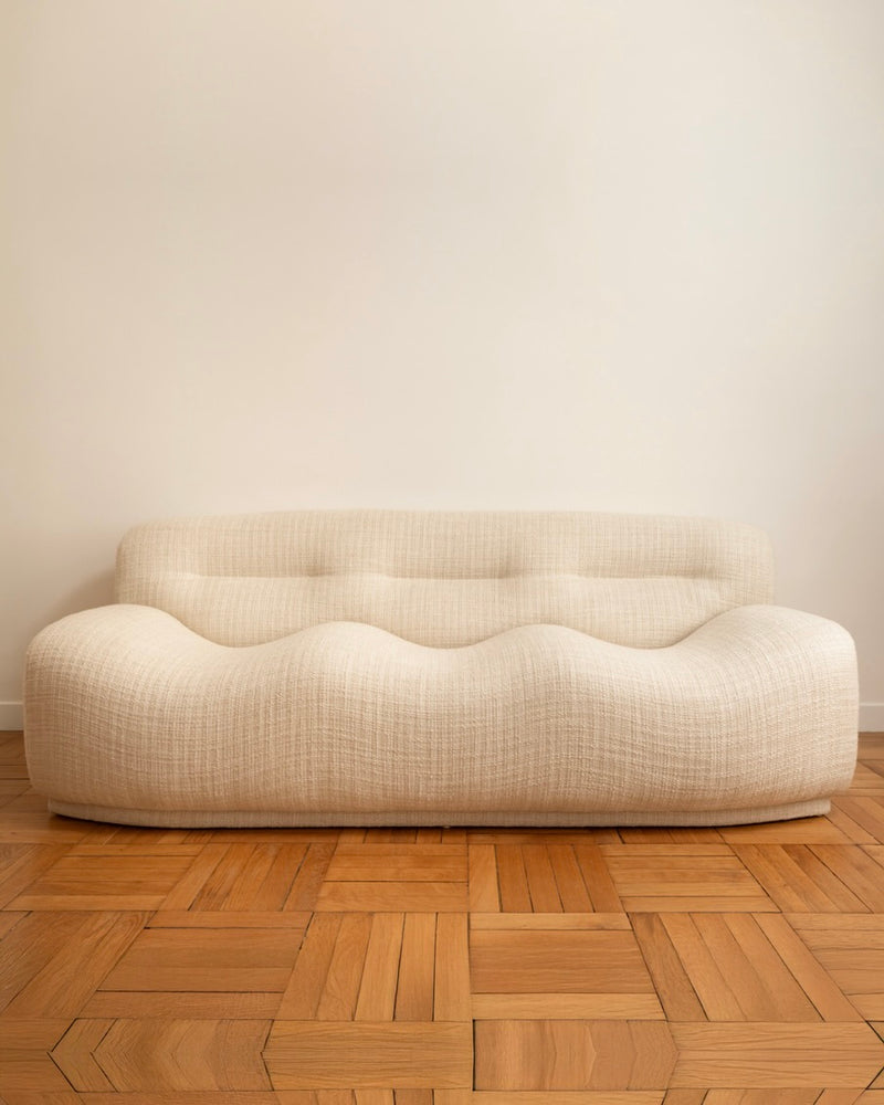 Cream upholstered wavy sofa Italian 1970s vintage design
