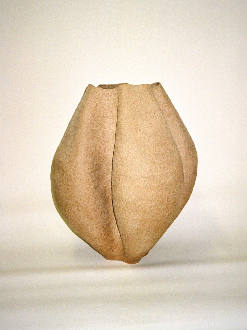 Organic beige ceramic growing vase with sculptural form