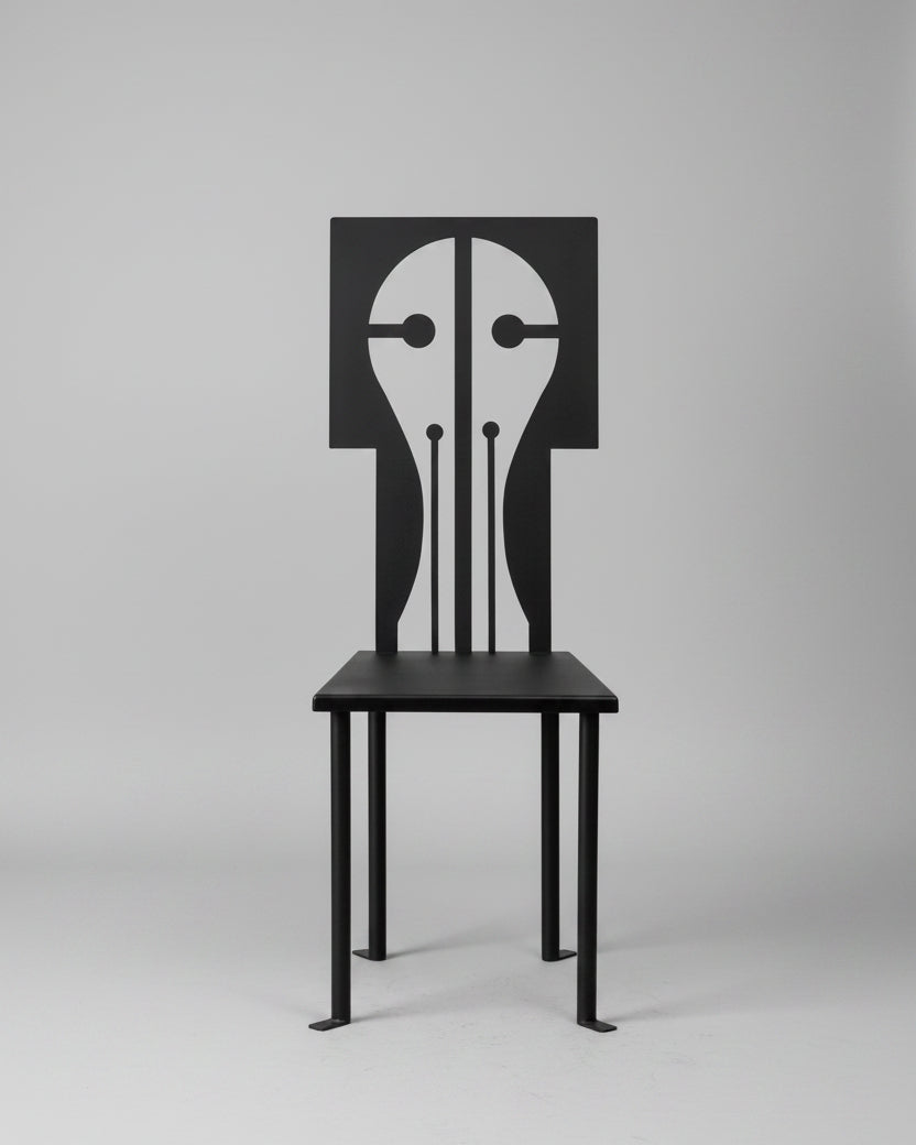 Black iron Epona chair with geometric face design backrest