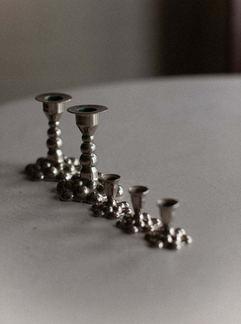 Bubbly Candleholders: Set of two stunning candleholders with a unique bubbly pattern and modern style
