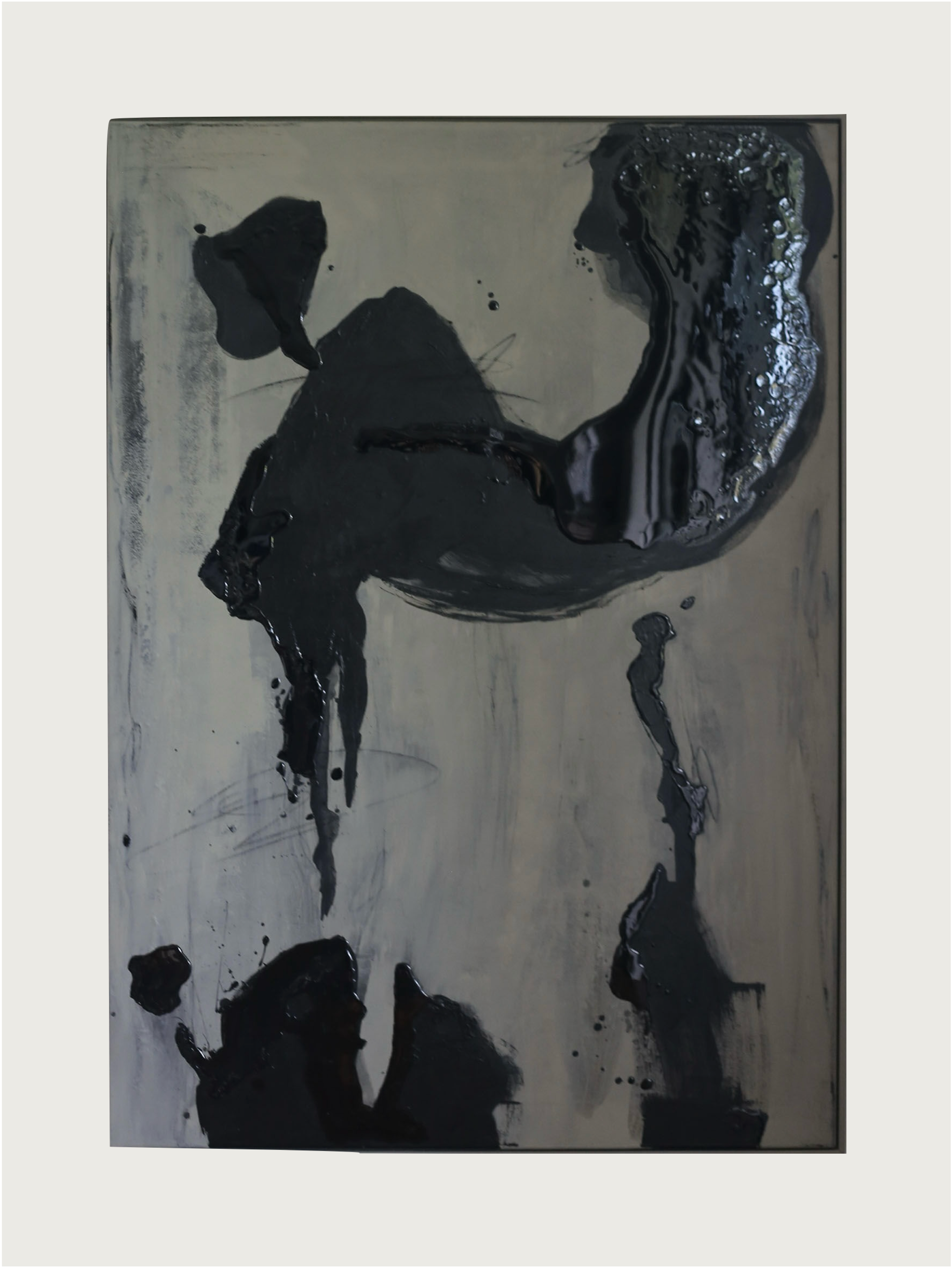 Introducing "Black Drift - Painting" by STUDIOPOLS, featuring bold, irregular black shapes and drips on a gray background. This framed canvas showcases high-contrast acrylic paint to create a dynamic and flowing appearance with a blend of smooth and textured surfaces.