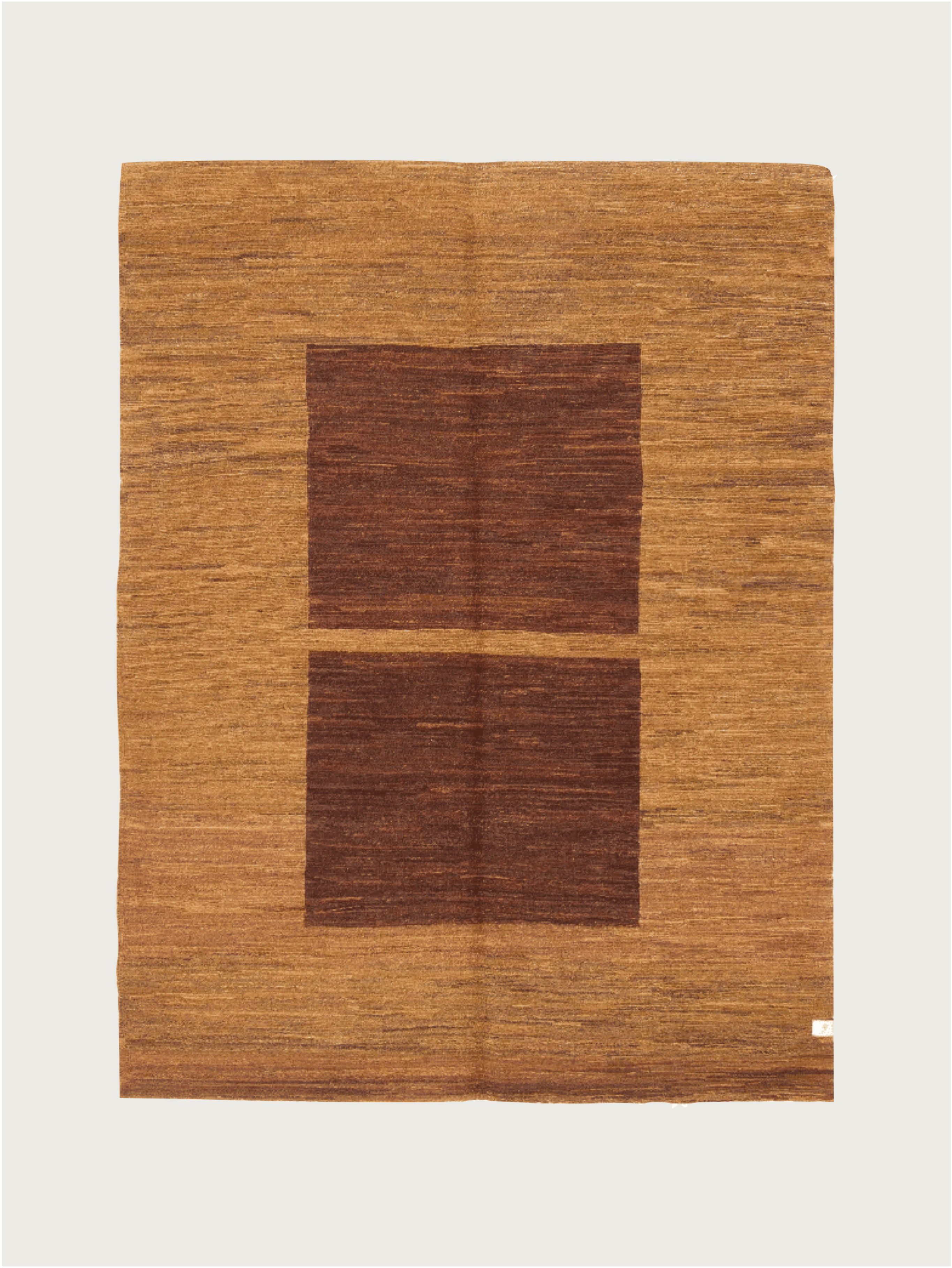 The Flatweave Rug in Goldenrod 152 x 195 cm by catalog:three is a square, hand-woven piece with a natural brown background and two darker brown rectangles aligned vertically. The wool kilim rug features a geometric design with subtle texture and visible yarn color variations.