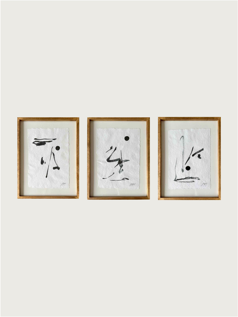Three framed abstract ink paintings by Paula Piquet in wooden frames