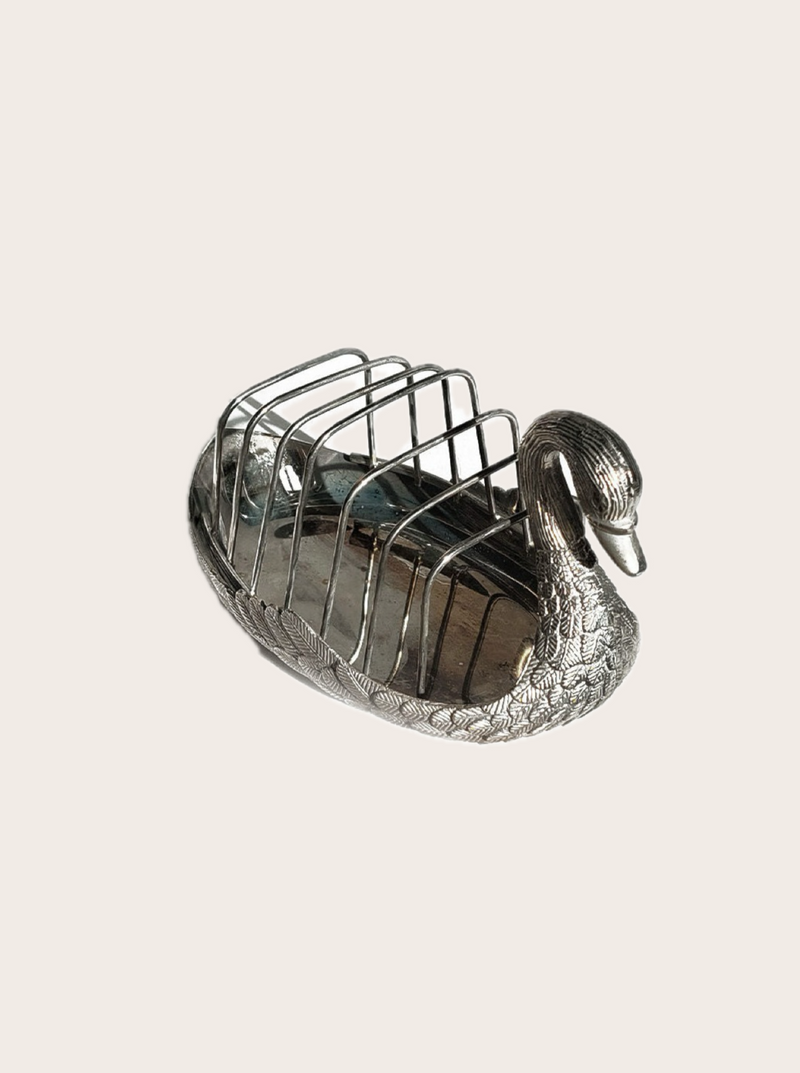 Vintage-inspired toast holder in the shape of a majestic swan