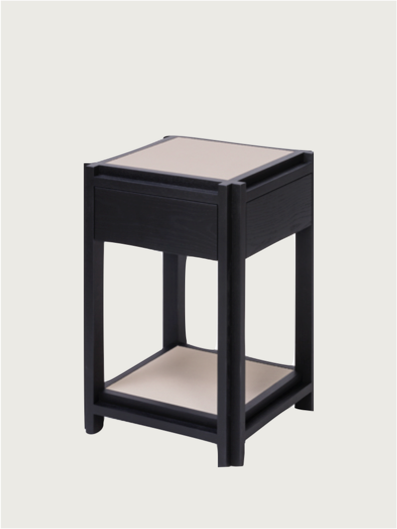 Black wooden bedside table with drawer and lower shelf detail
