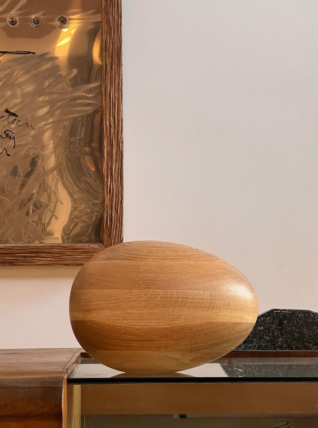 Natural Oak Egg Sculpture displayed on a white background with soft lighting, highlighting its smooth and organic shape, perfect for adding a touch of nature to any space 