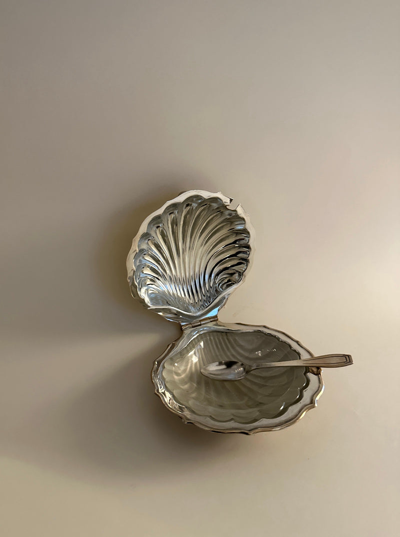 White ceramic shell shaped butter dish with lid and handle