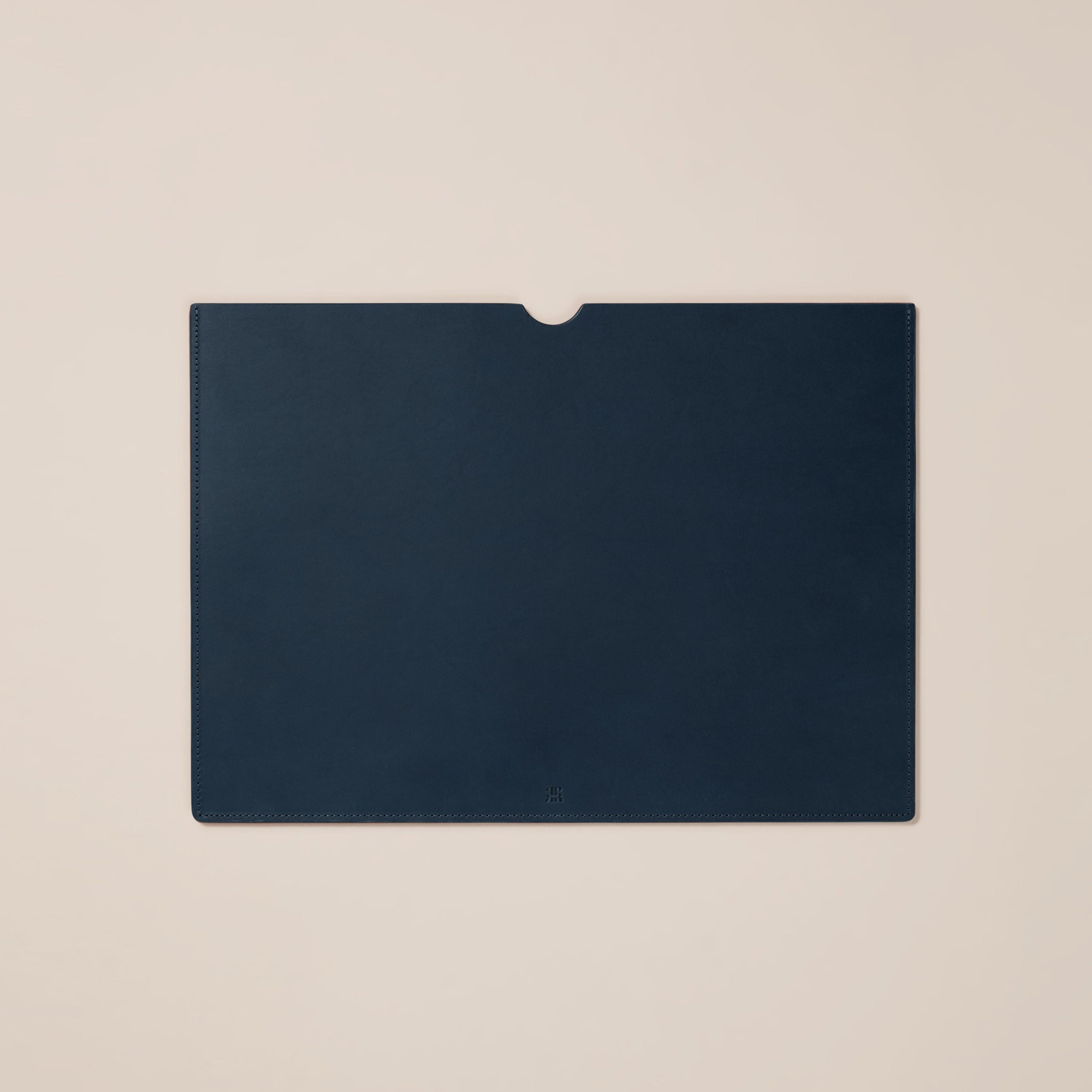 Leather Laptop Sleeve — back view showing navy leather material