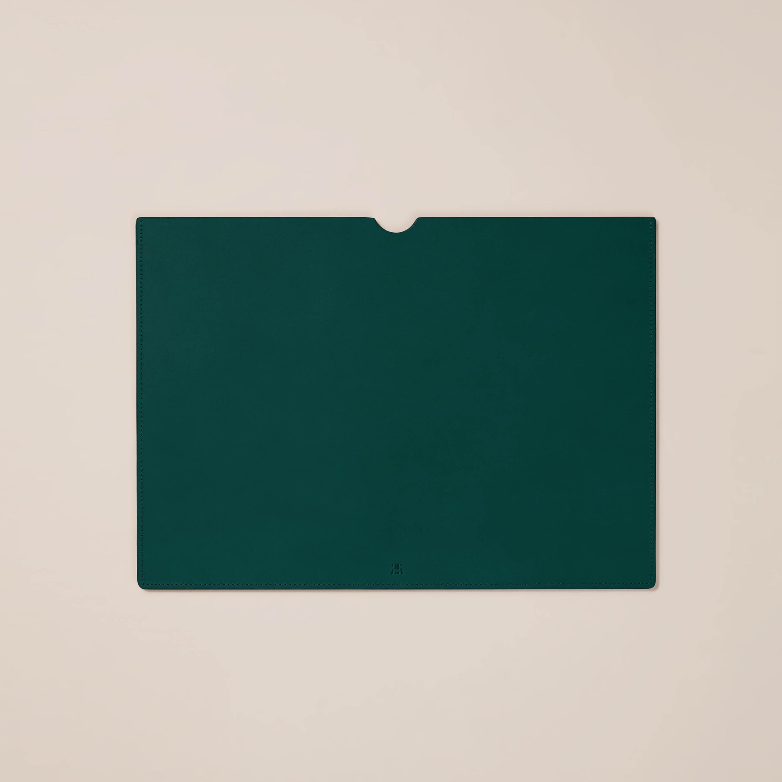 Leather Laptop Sleeve — flat view of dark green leather surface