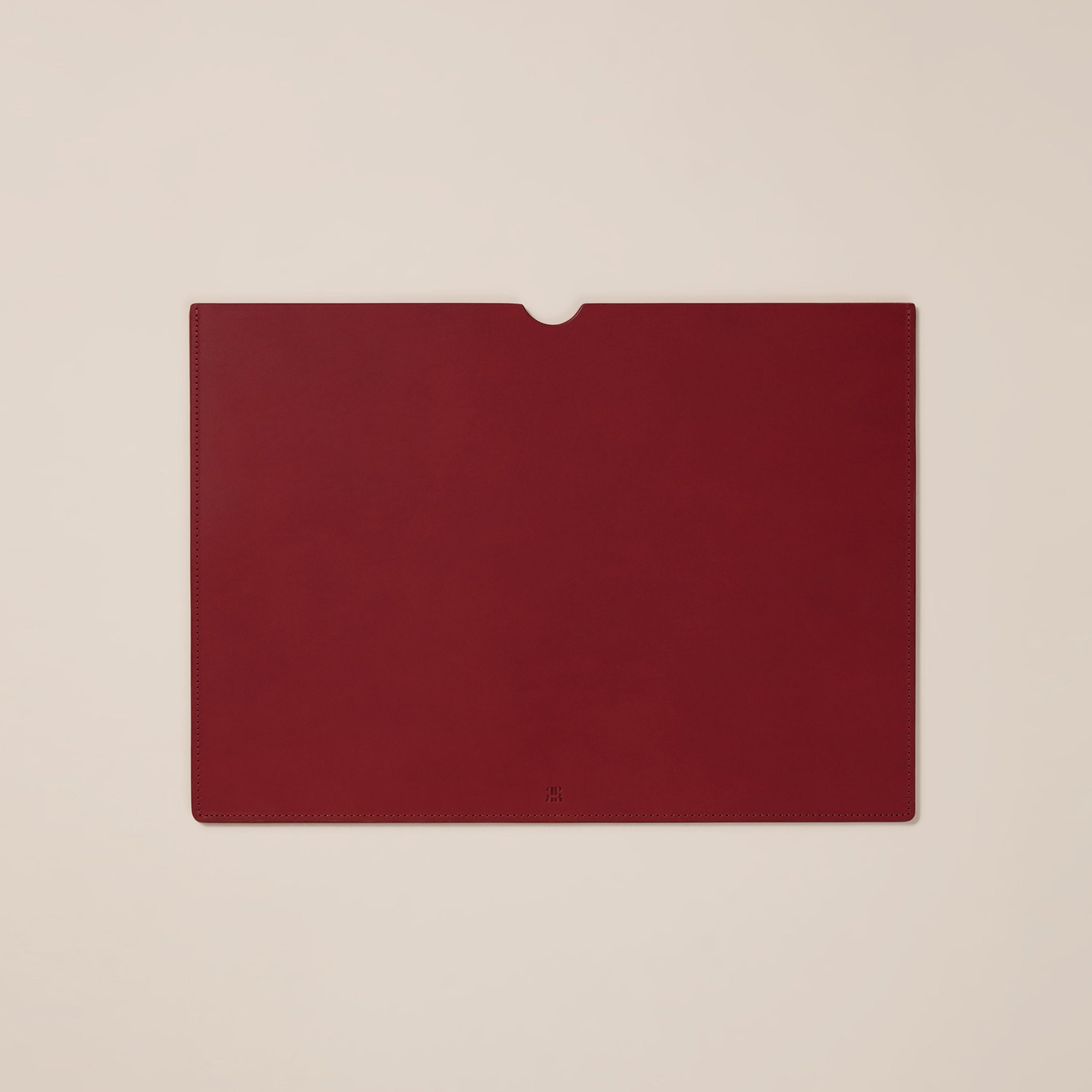 Leather Laptop Sleeve — flat view of burgundy leather texture
