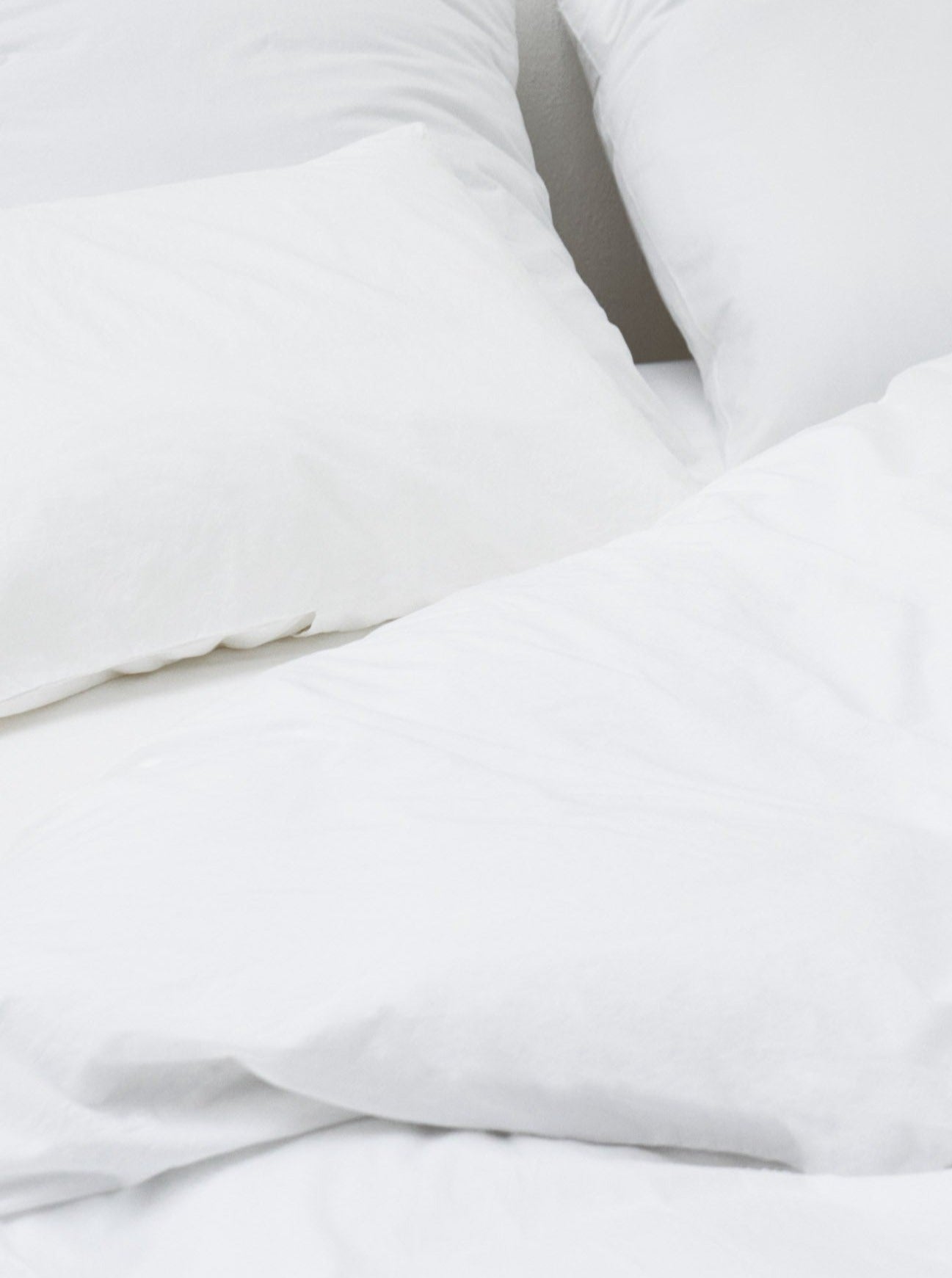 White Washed Cotton Percale Bed Set — close-up of white bedding texture
