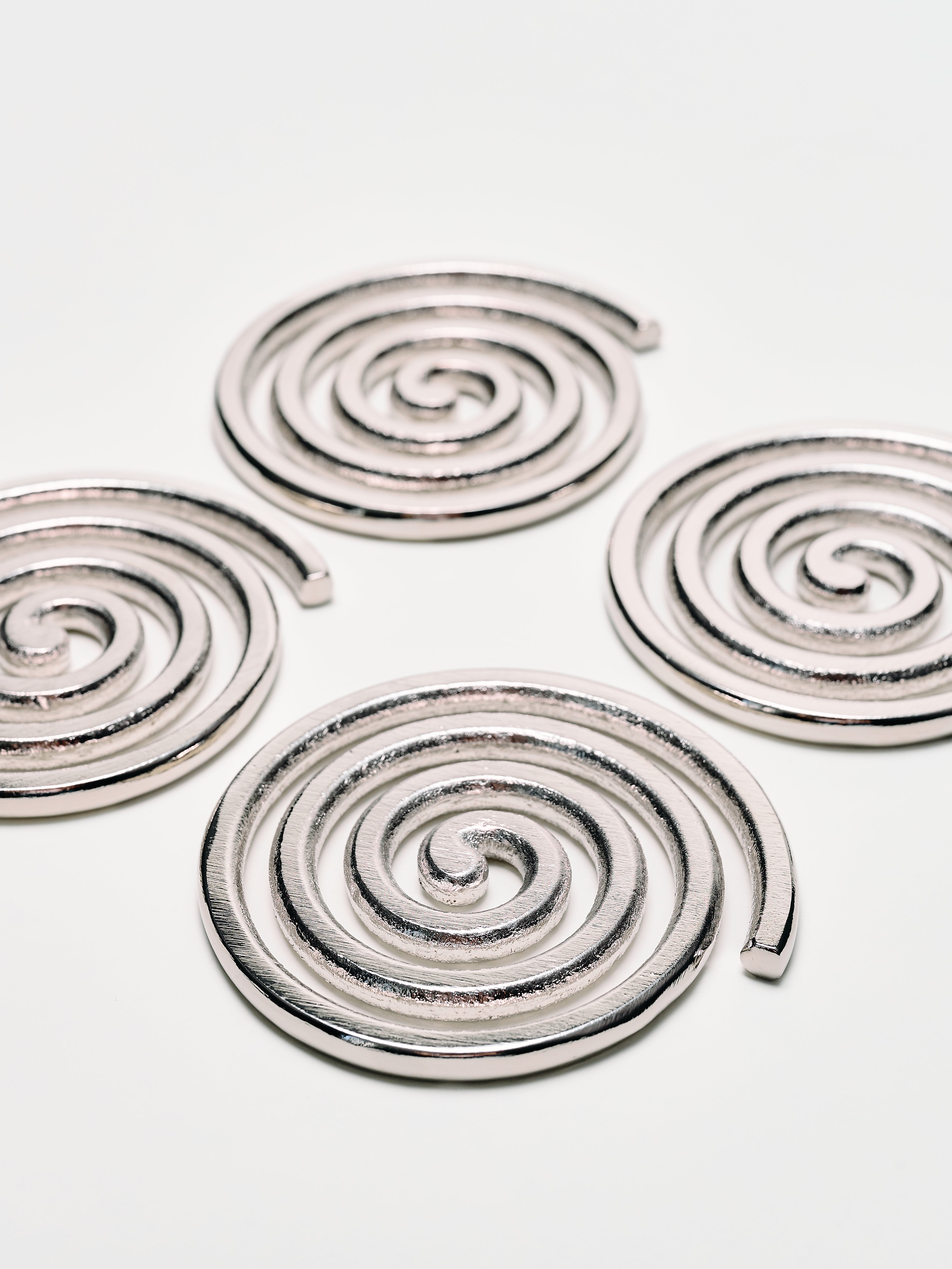 Spiral Coasters by Sophie Lou Jacobsen – Set of 4 — in context