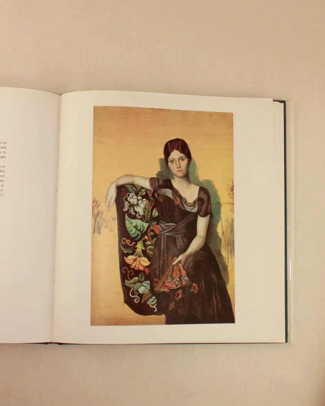 PICASSO 'THE MASTERWORKS' — open book on beige fabric background