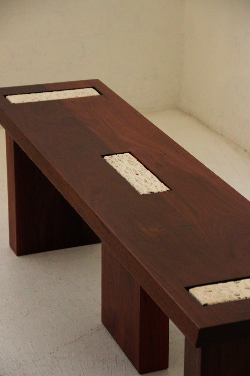 Bench — close-up of wooden surface with textured inlays