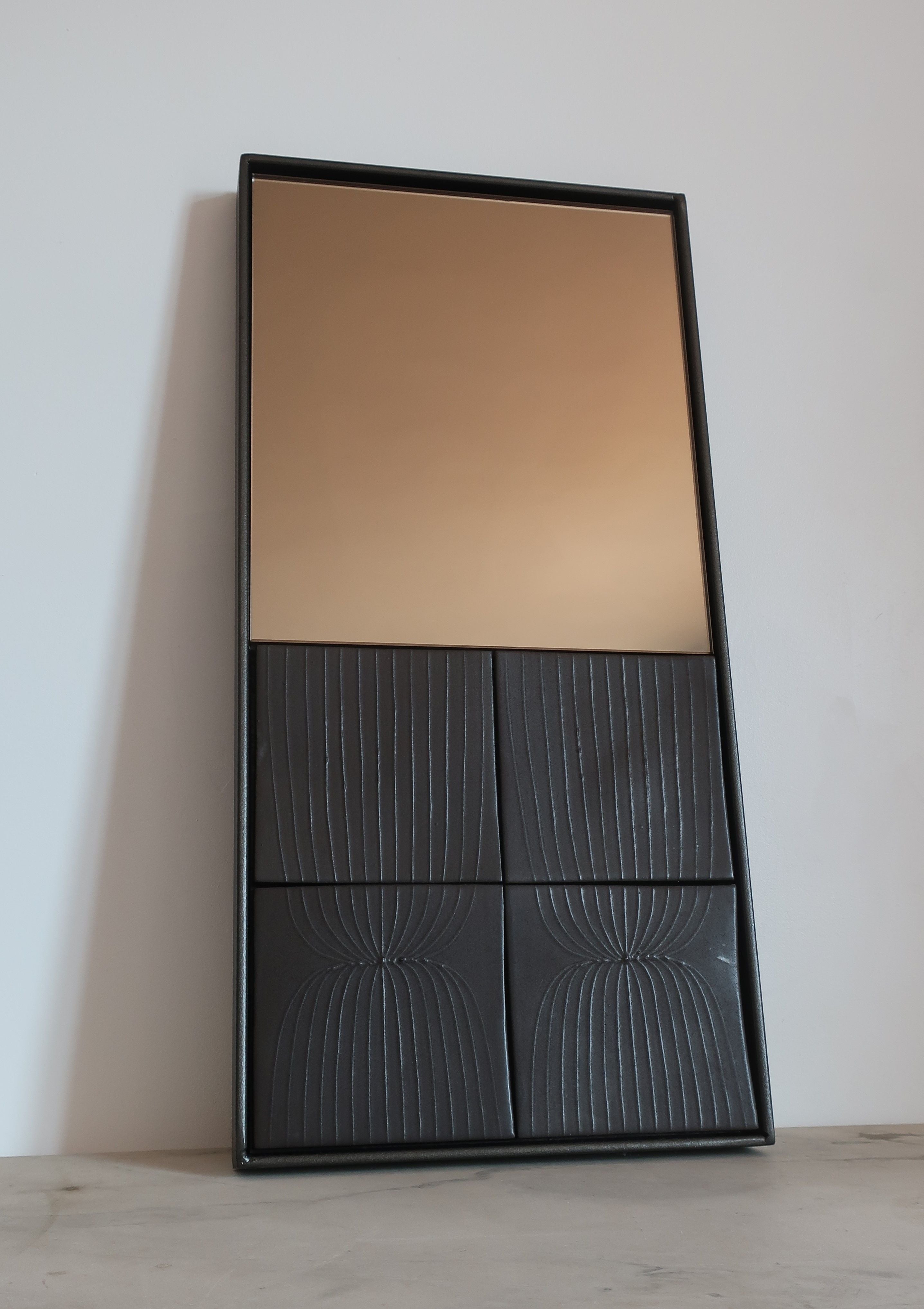 EQUIS sculptural mirror with bronze glass and geometric black frame by ORRE Studio