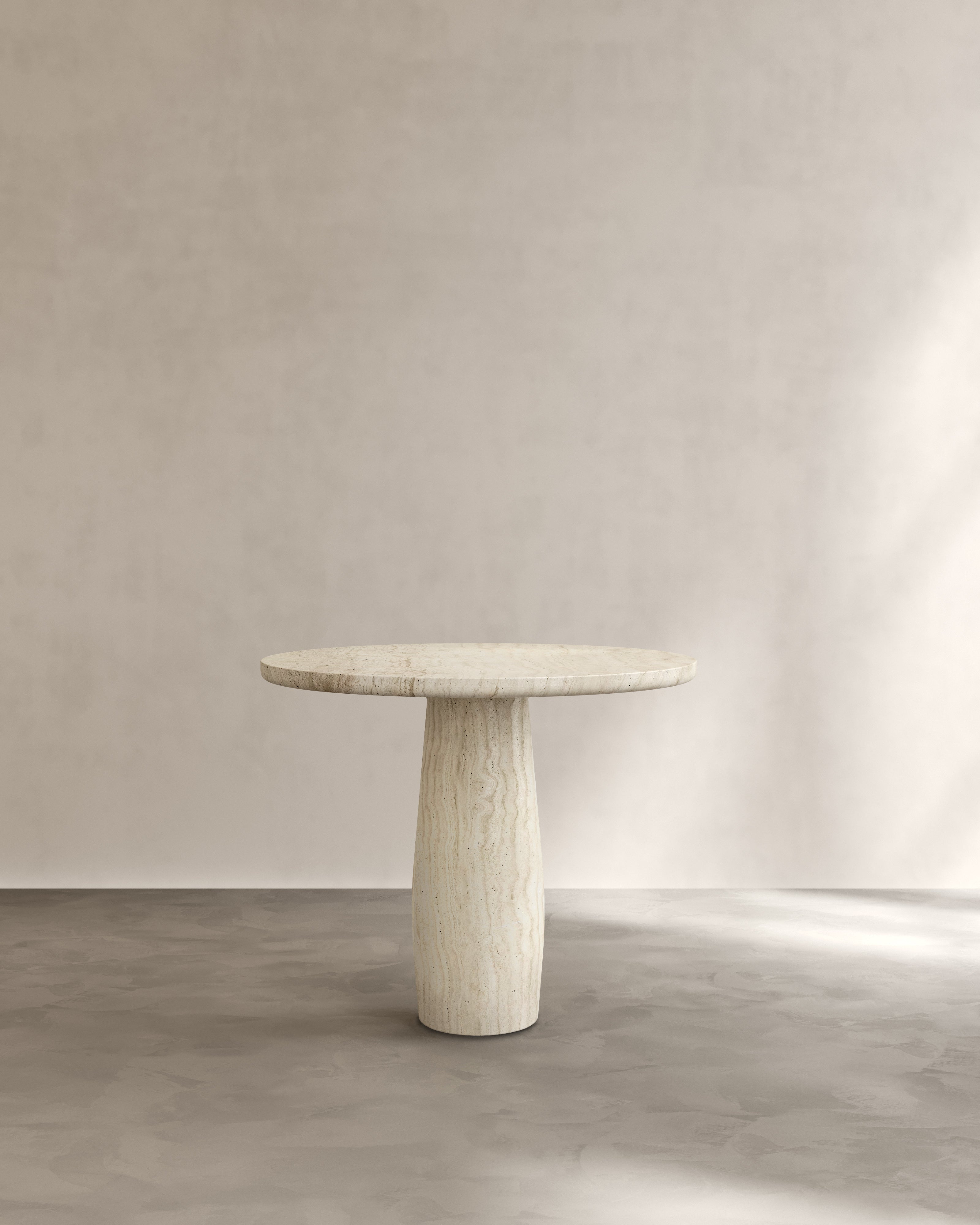 Raffaella Table I — close-up of light-colored stone surface