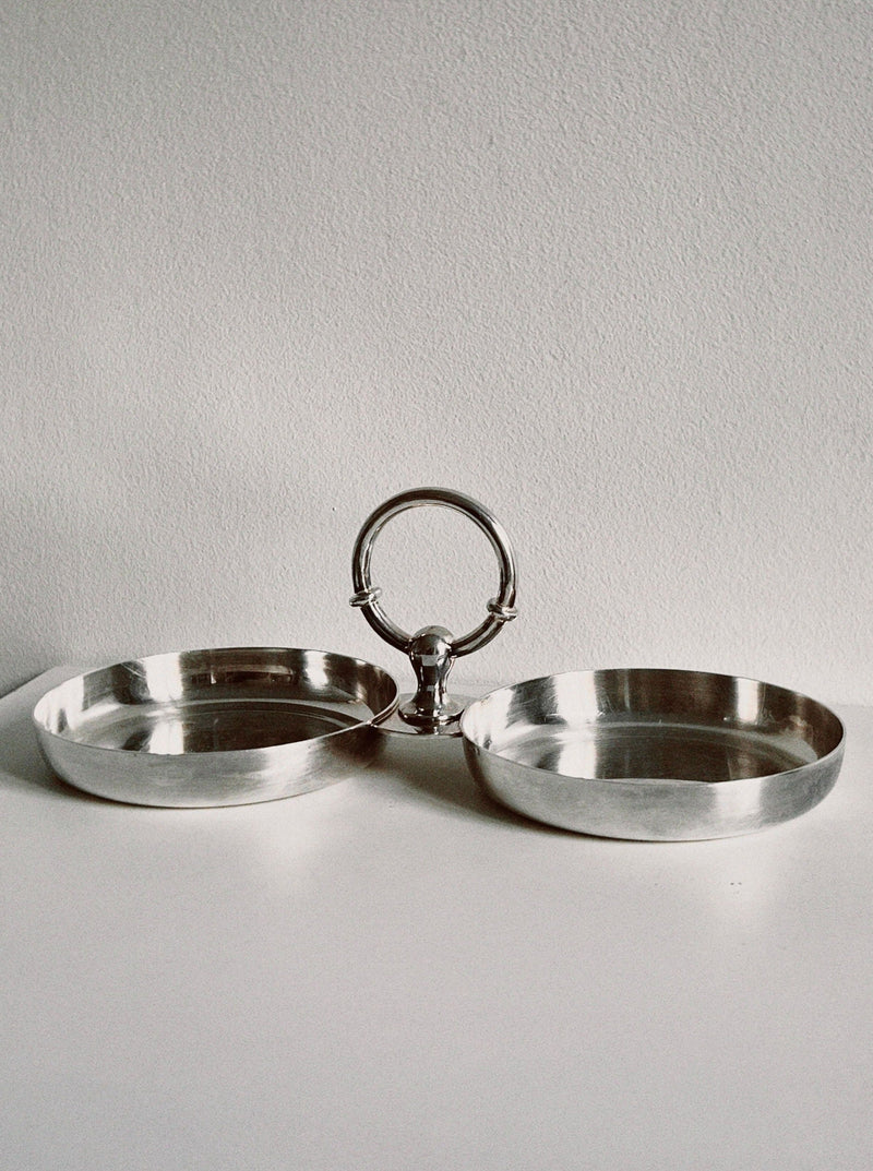 Elegant silver double serving tray with central ring handle