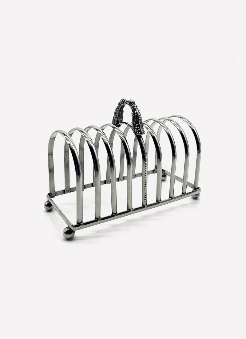Vintage silver-plated toast rack with decorative rope tassel handle