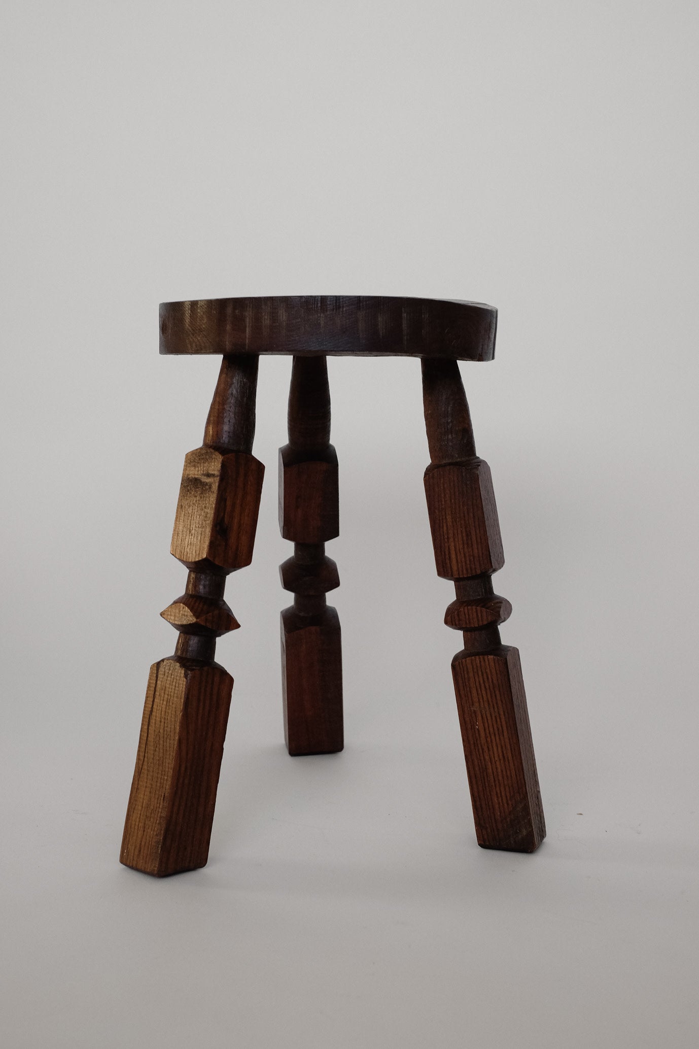 Pair of Mid-Century Rustic Tripod Stools — side angle