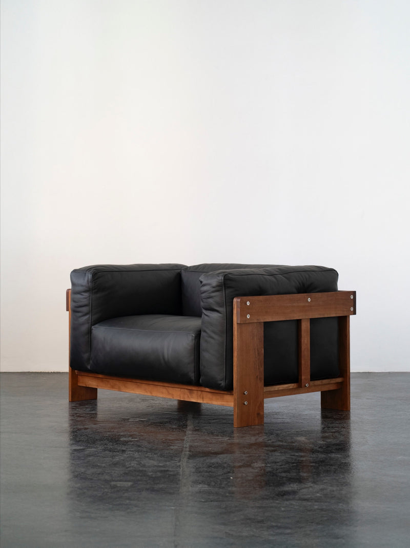 Overlap Lounge Chair | DN_S2503 by SUPER95 | The Oblist — black leather, wooden frame