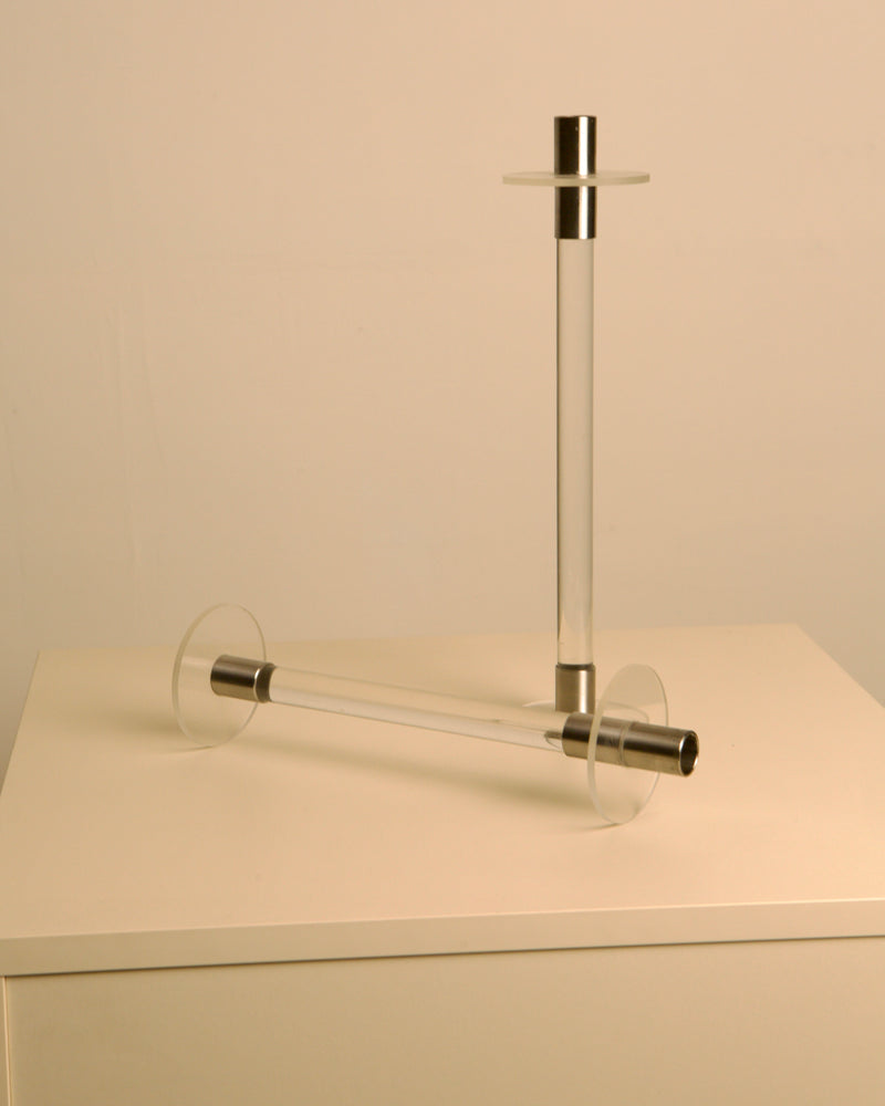 Lucite and silver candlesticks detail showing transparent acrylic tubes