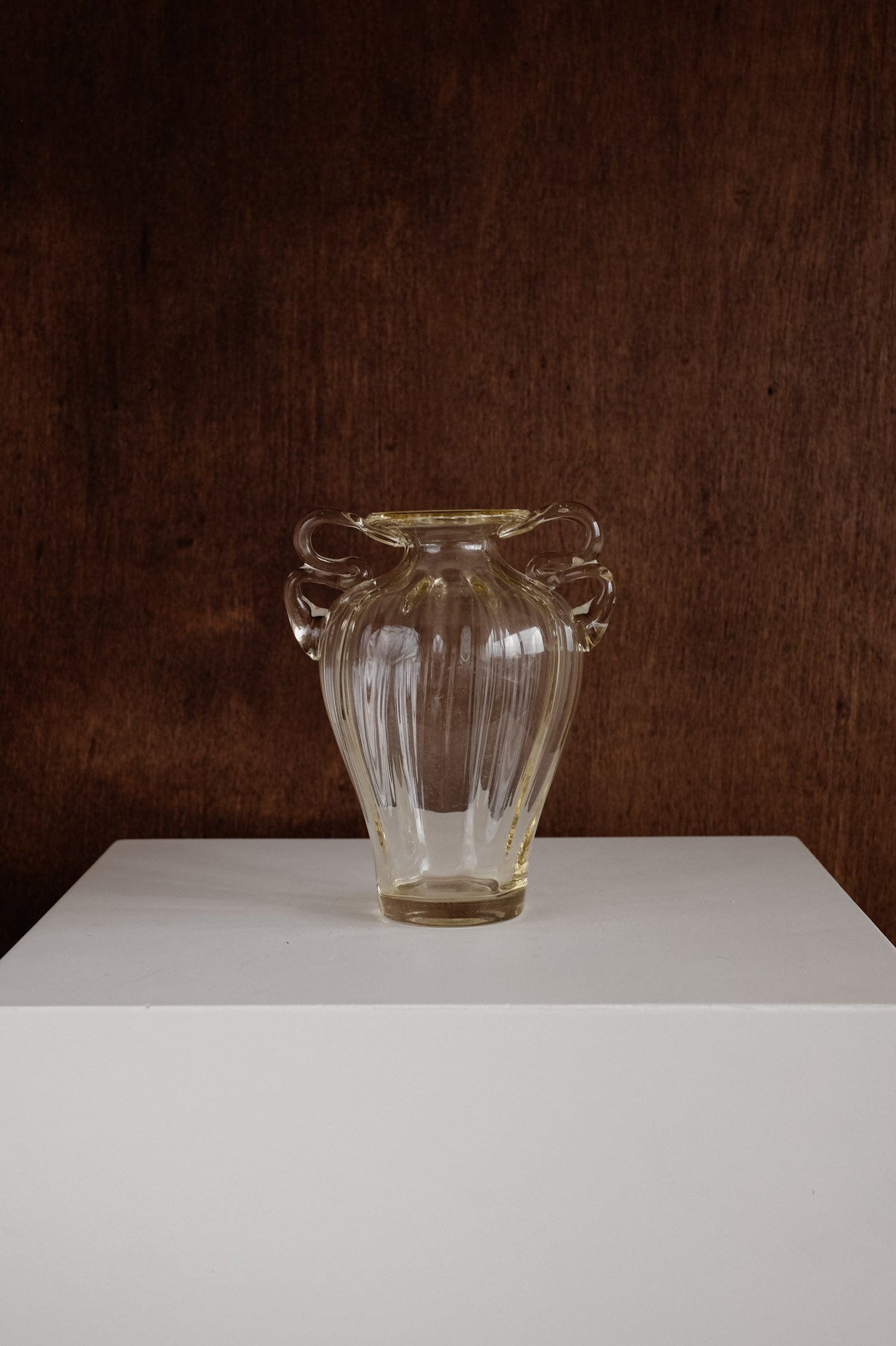 Elegant Handcrafted Glass Vase with Decorative Handles — detail view