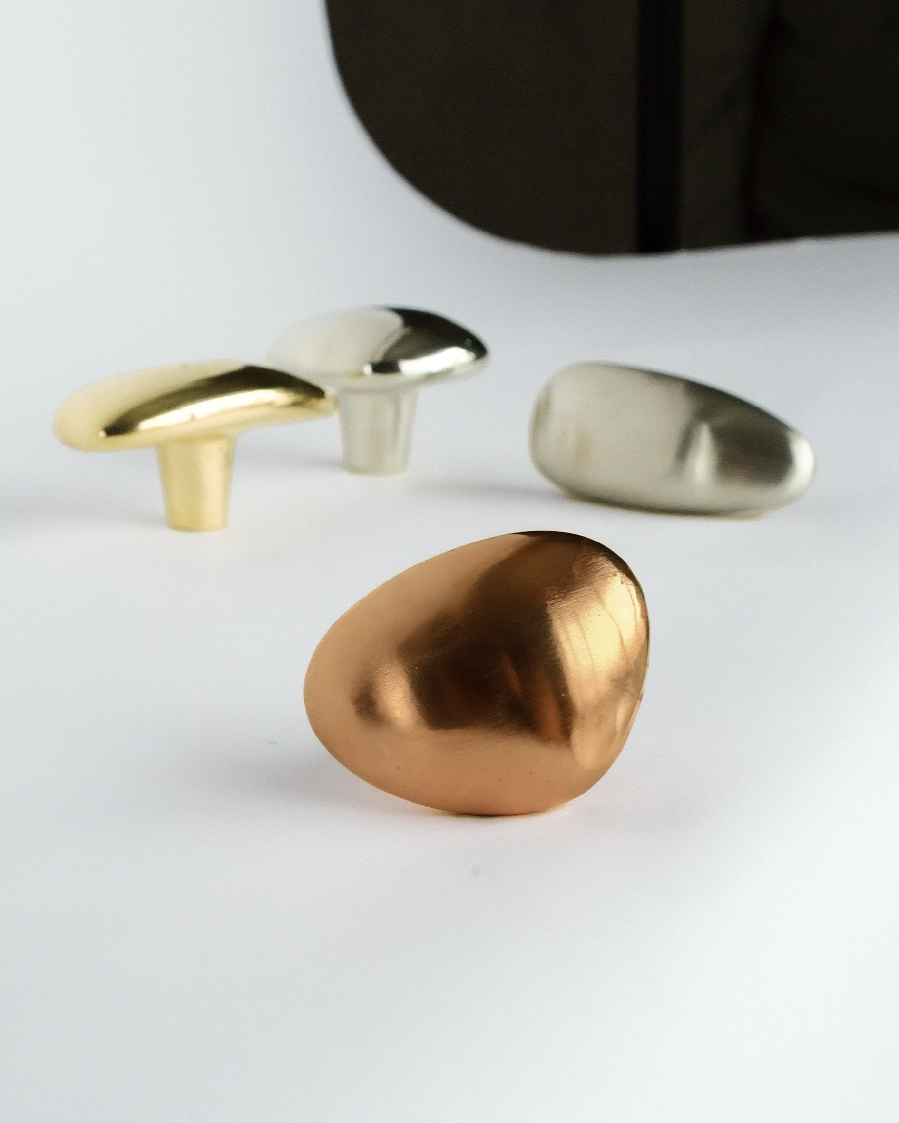 MOMI Cabinet Knob/Wall Hook Short — close-up of copper finish on white background