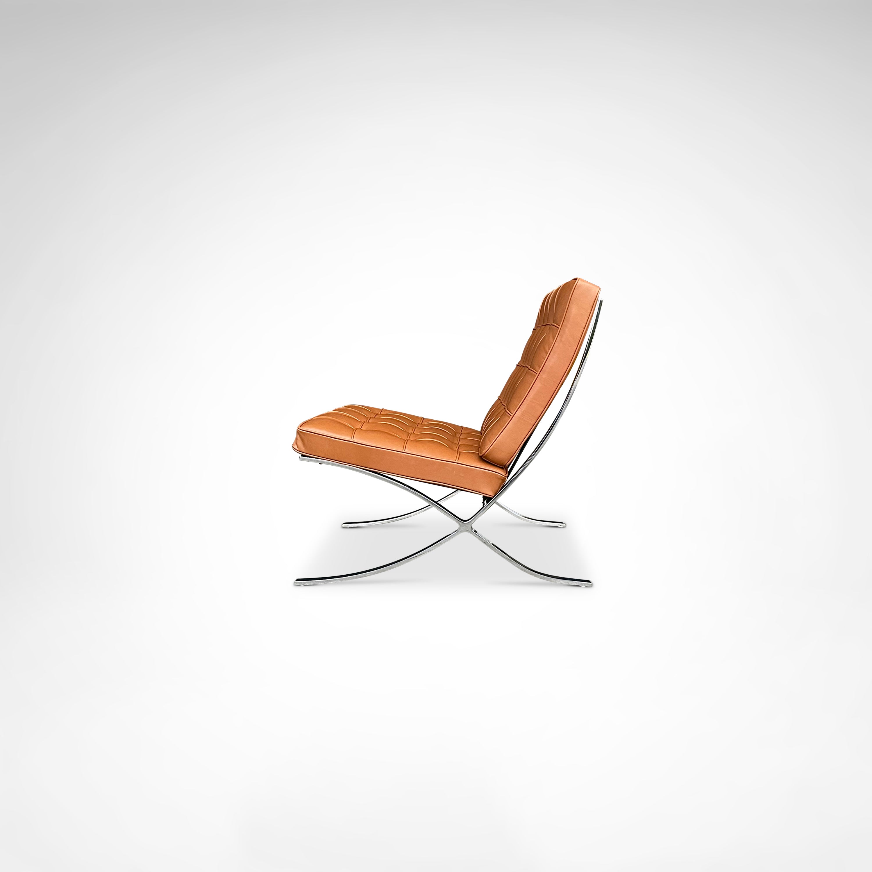 Barcelona lounge chair MR90 by Mies van der Rohe for Knoll — side angle
