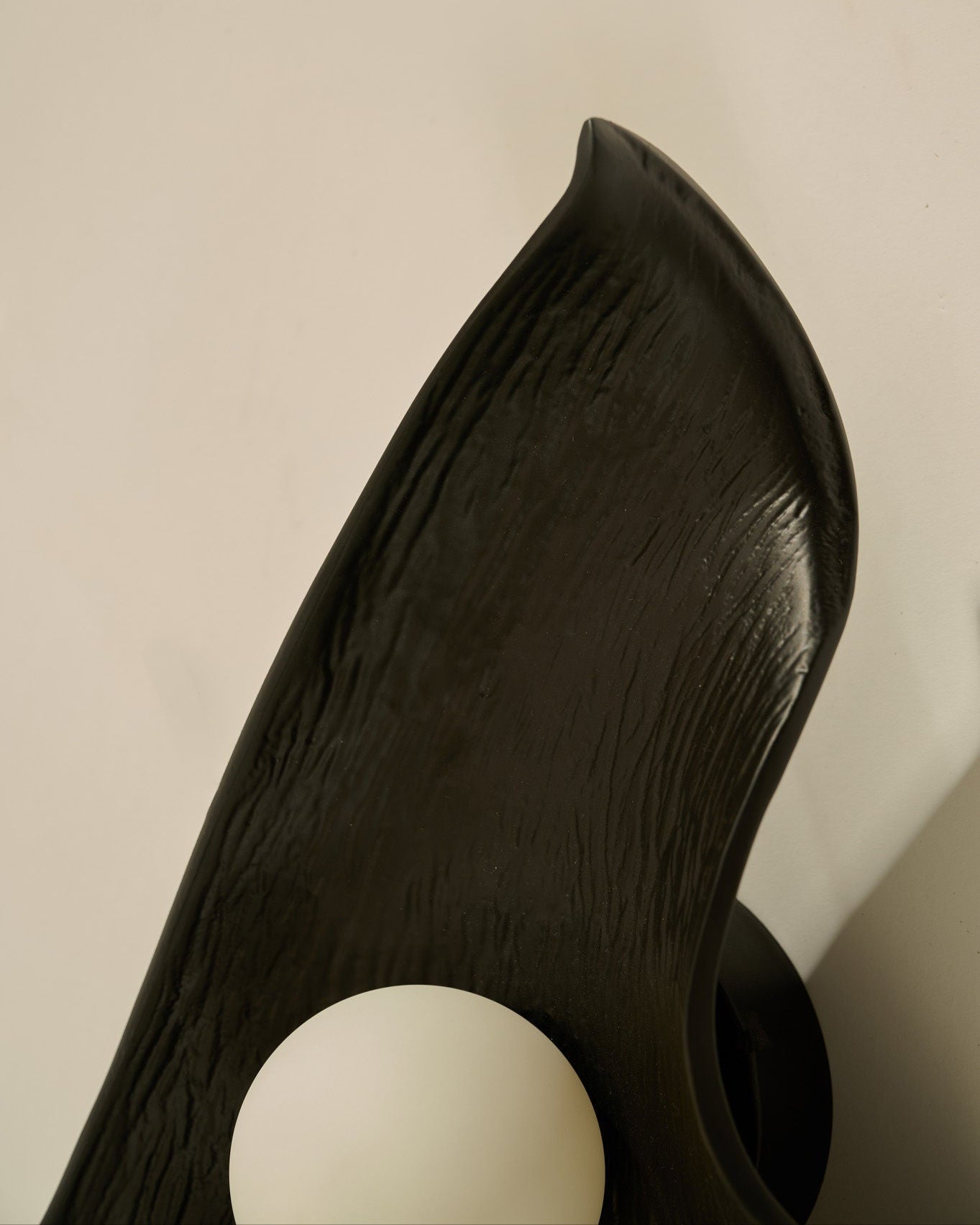 Foliage Wall Light — side angle showing textured black finish