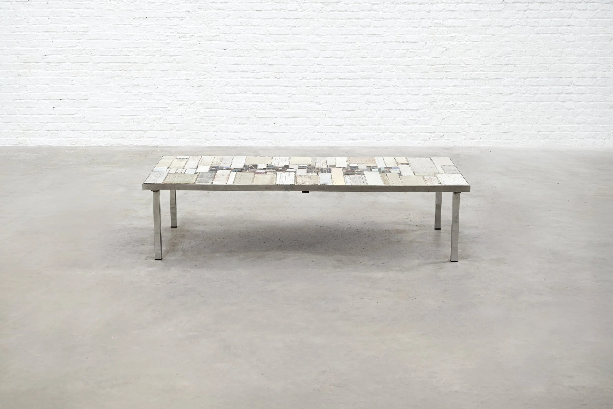 Brutalist Coffee Table by Pia Manu — back view of textured surface and metal legs