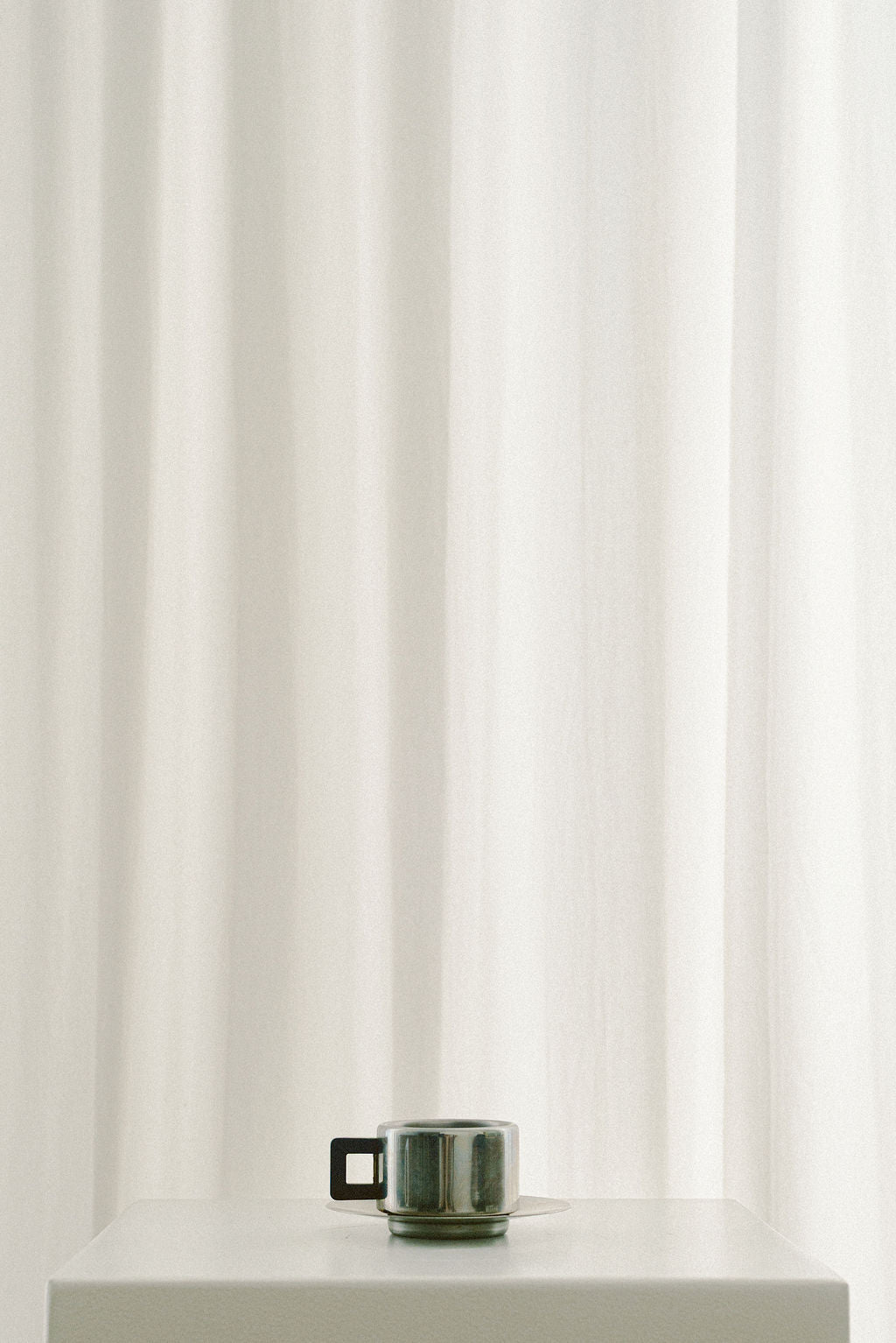 Casalinghi STO Stainless Steel Espresso Cups — side angle on white pedestal